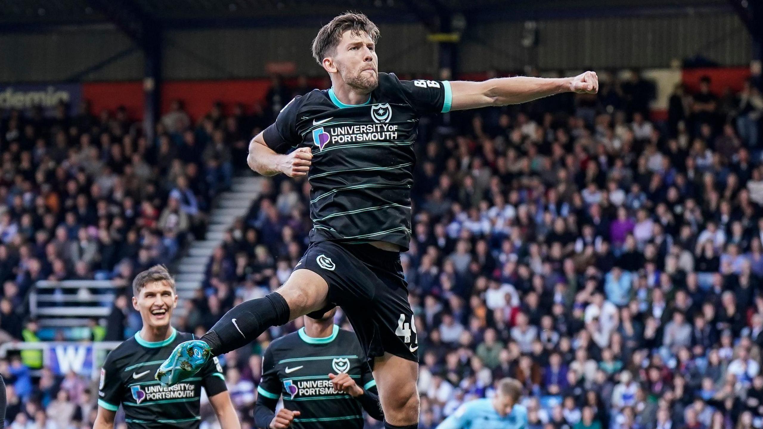 Callum Lang celebrates scoring a penalty against QPR