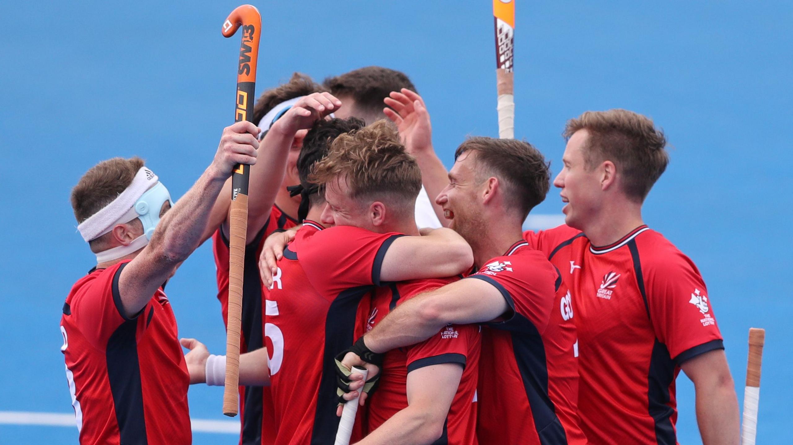 Gareth Furlong is congratulated after scoring Great Britain's fifth goal against Ireland