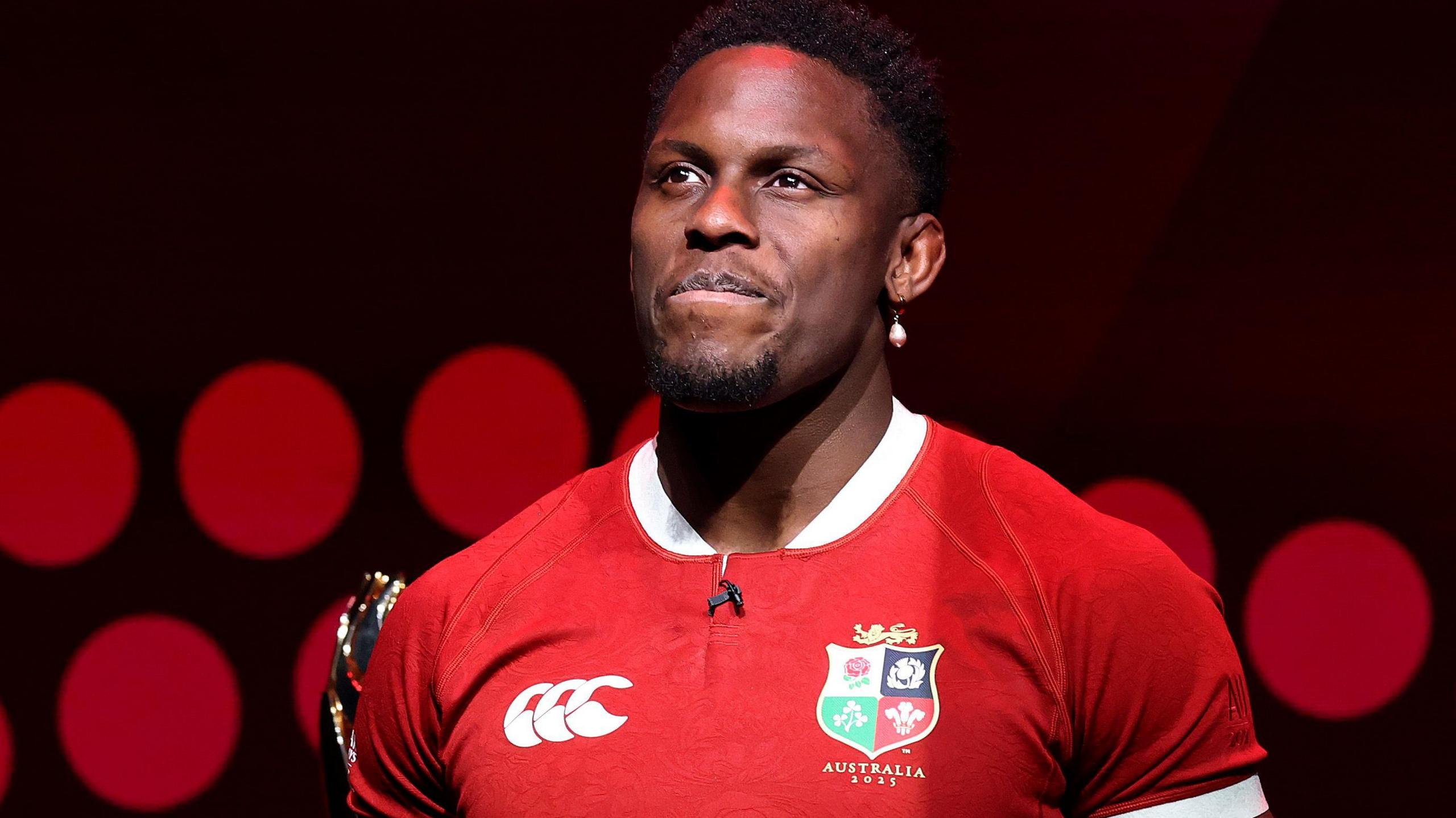 Maro Itoje wearing a Lions shirt