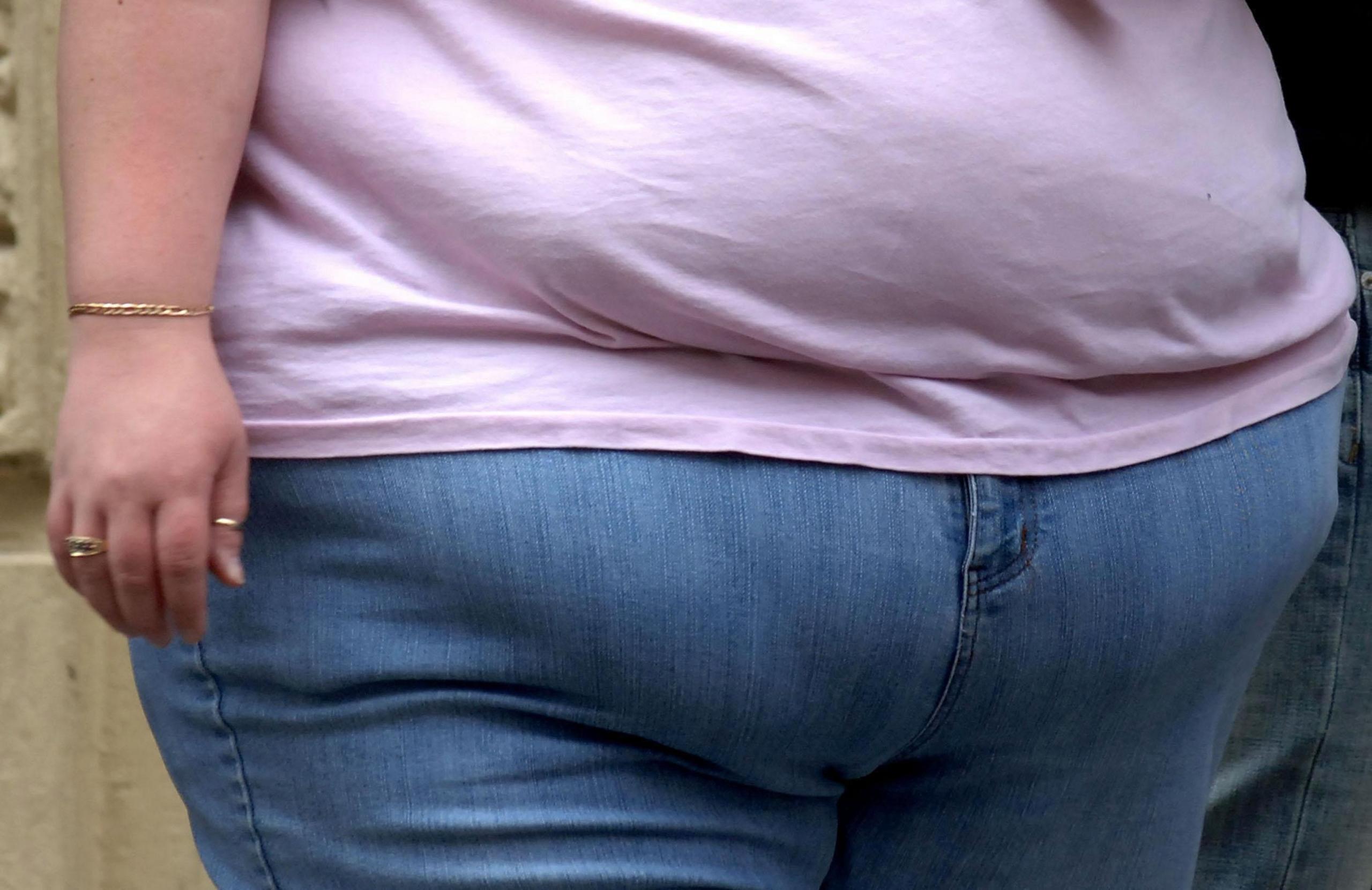 The waist of an obese woman