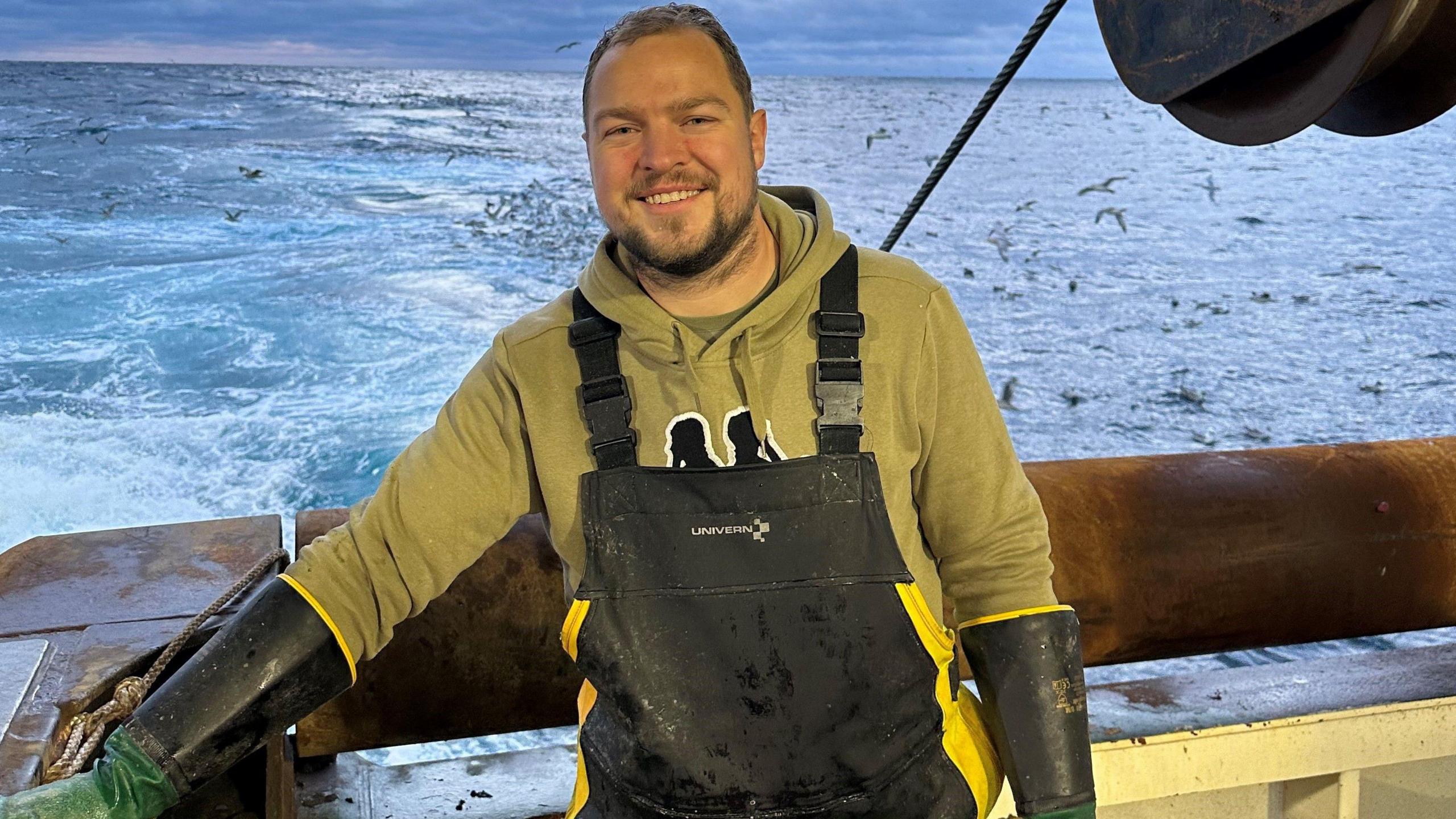 Sondre Alnes-Bonesmo on his fishing boat