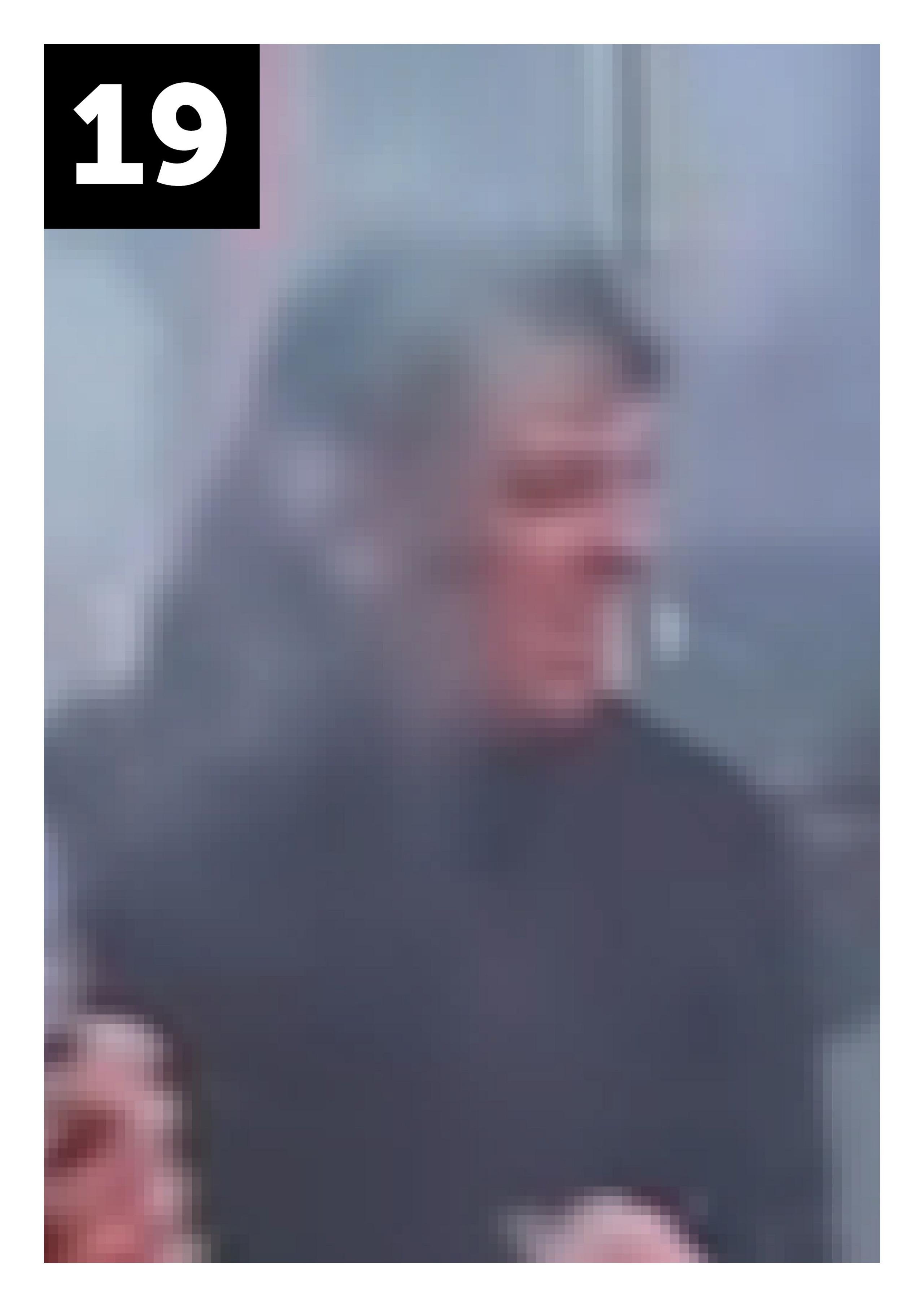 Blurry image of man in dark top