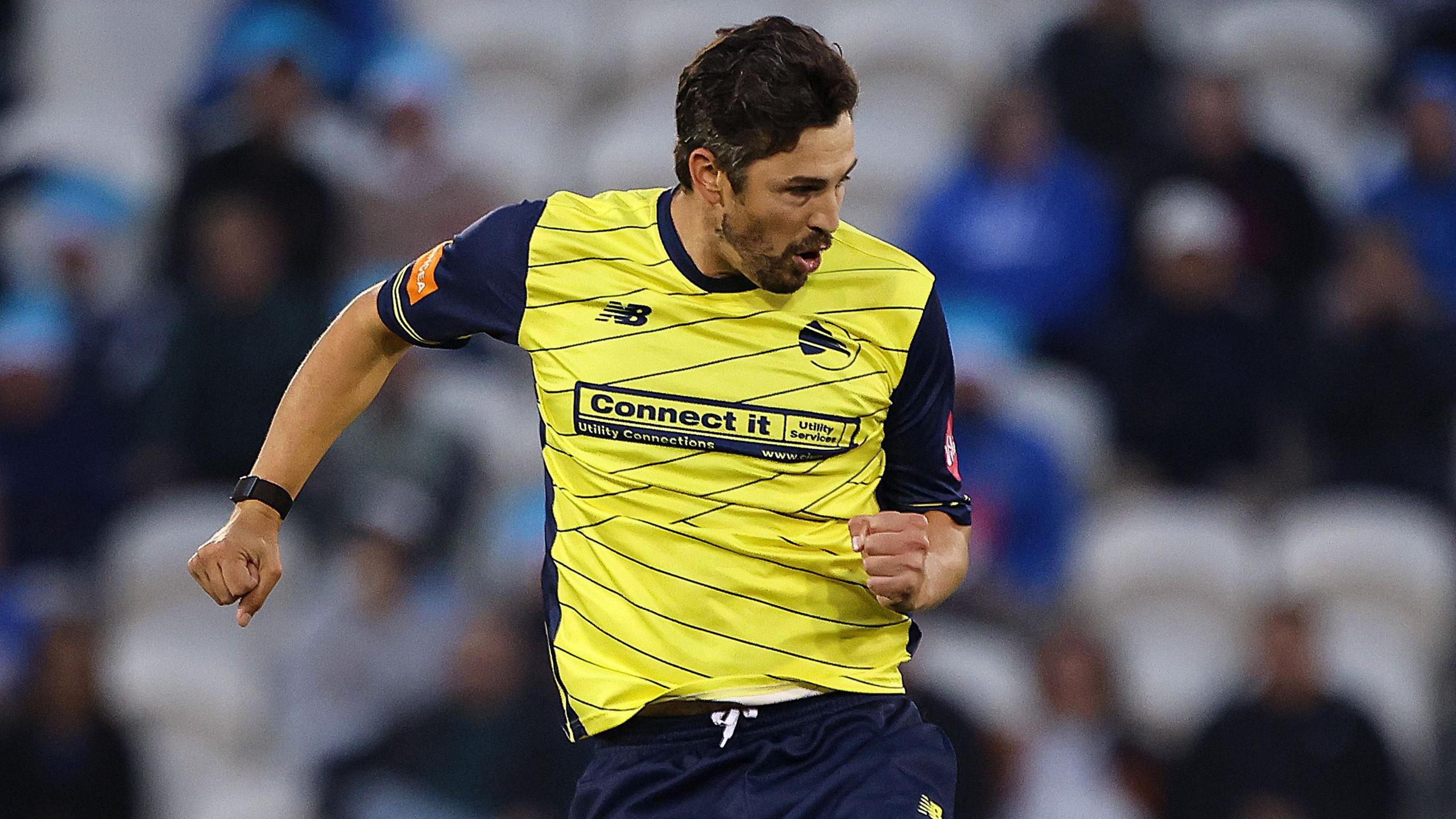 Chris Wood celebrates after claiming a wicket for Hampshire 