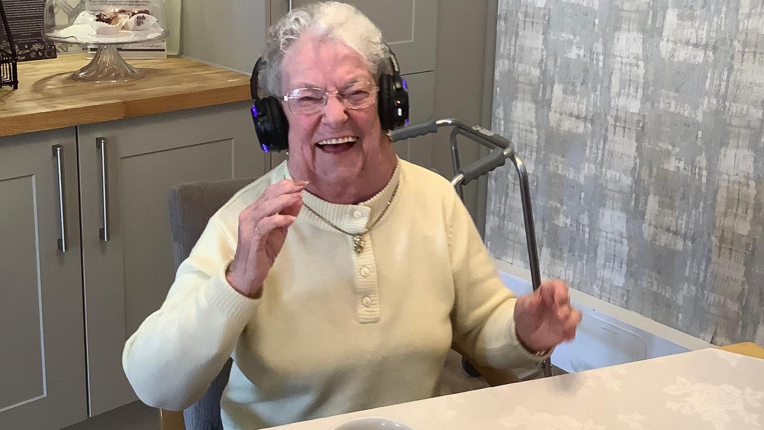 Pat King, 91, enjoying the music of the silent disco