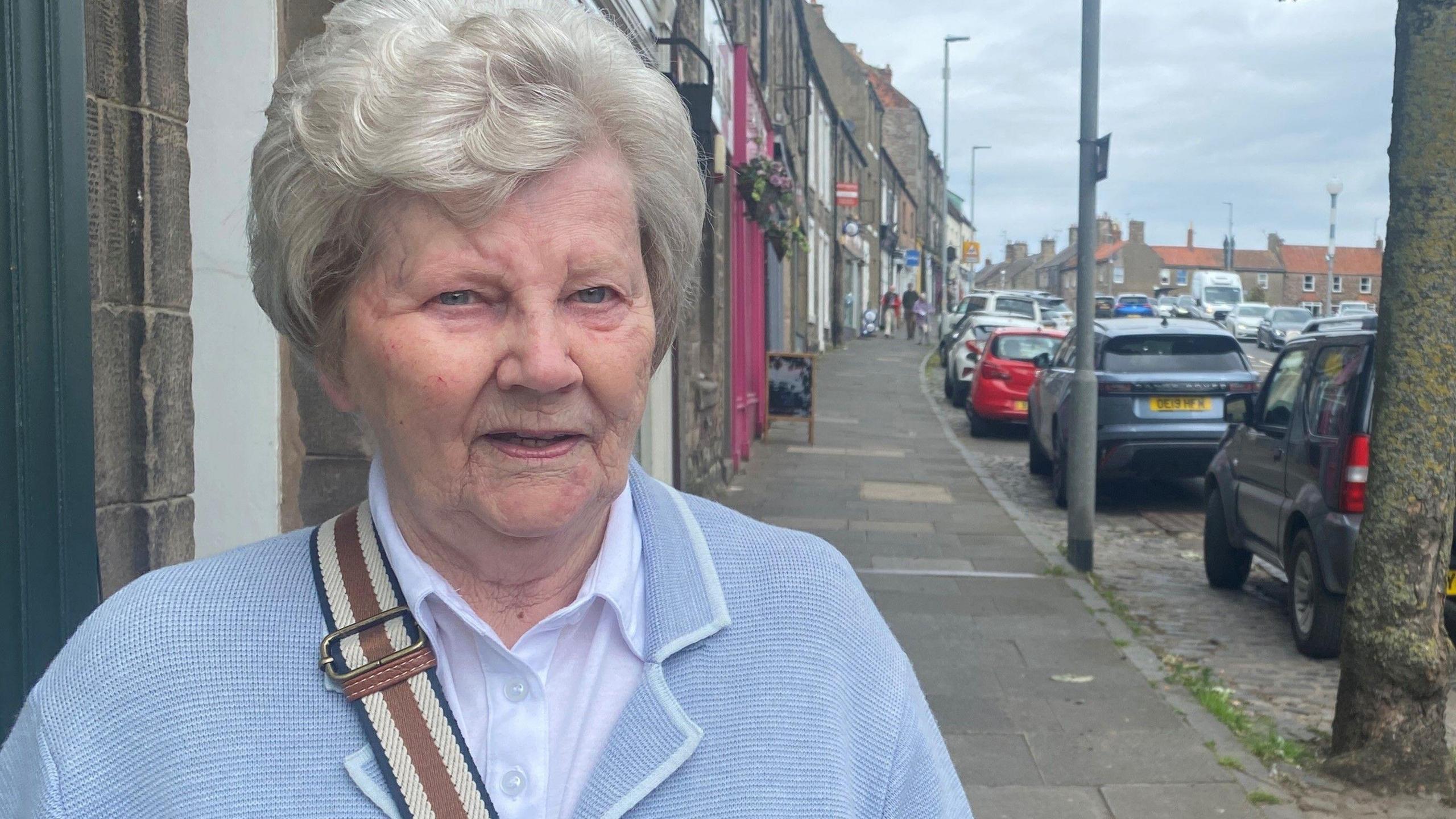 Dorothy Wakenshaw standing on Berwick high street 