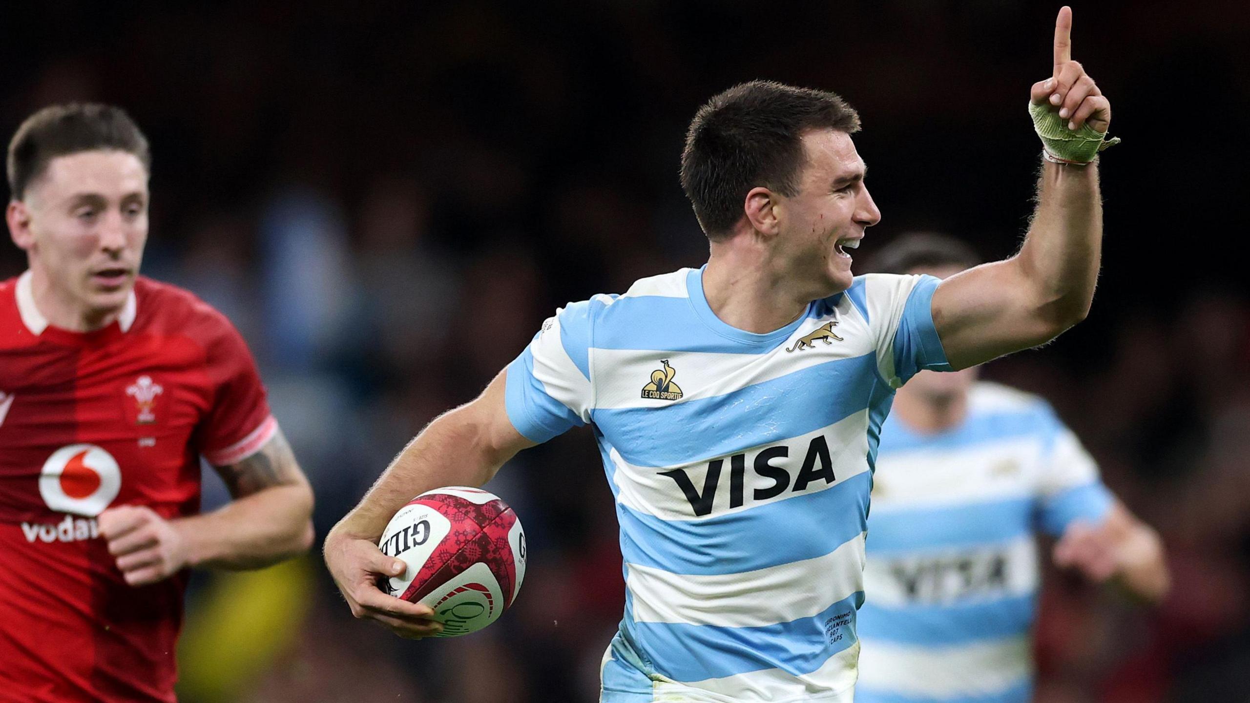 Geronimo Prisciantelli of Argentina heads to the line for his side's sixth try with Josh Adams trailing in his wake