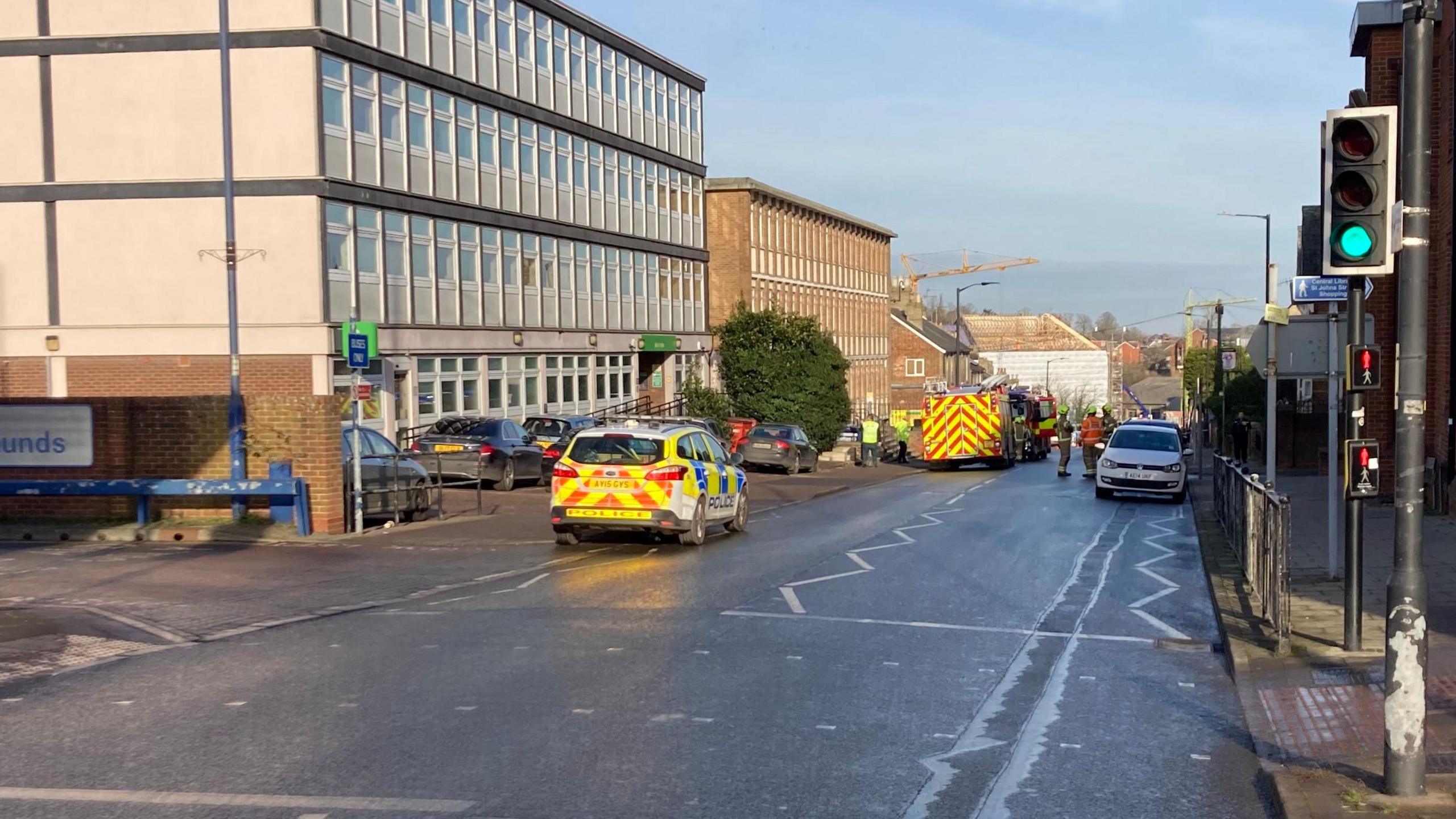 A police car and a fire engine can be seen responding to an incident in Bury St Edmunds