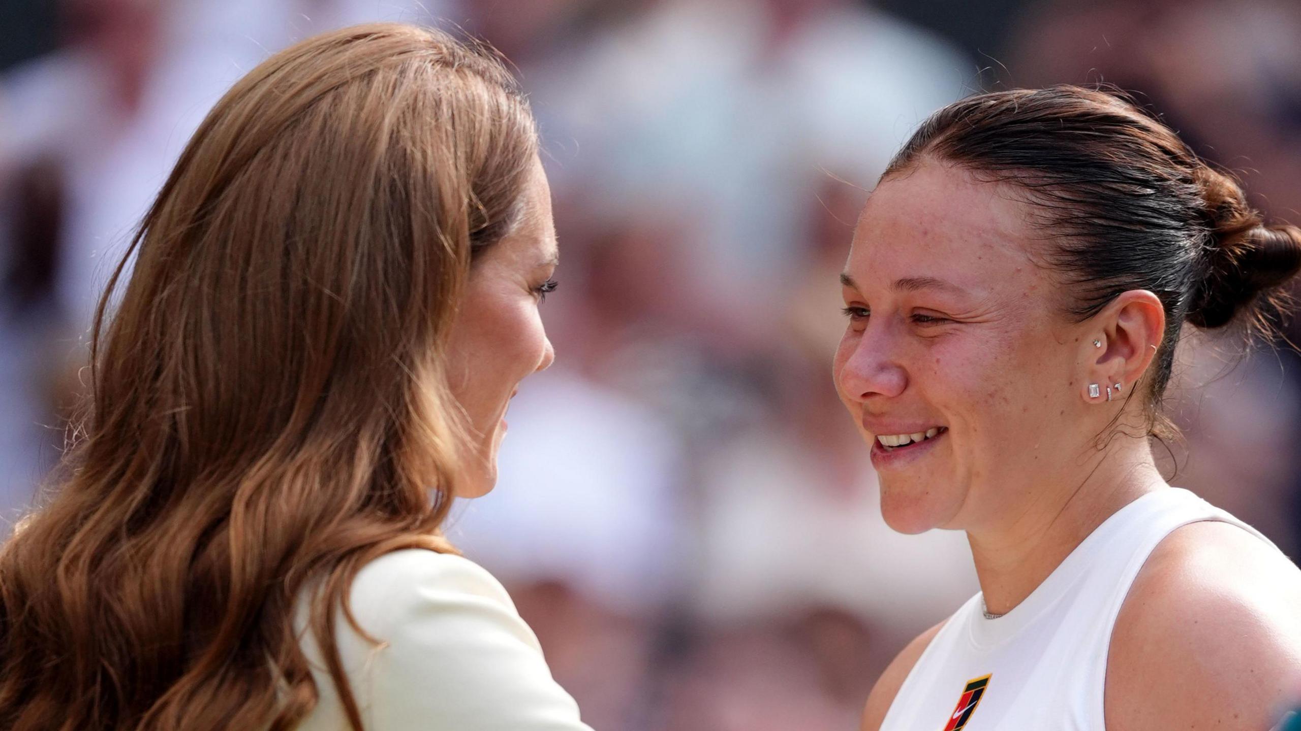 Amanda Anisimova is consoled by the Princess of Wales