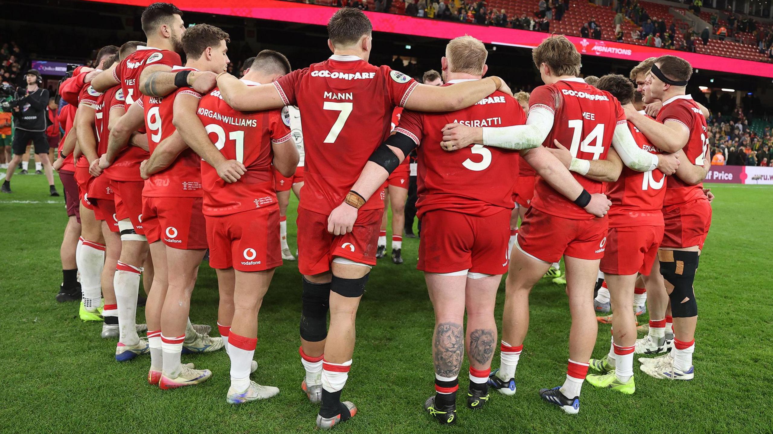 Wales players in a huddle after a 73-0 defeat to South Africa