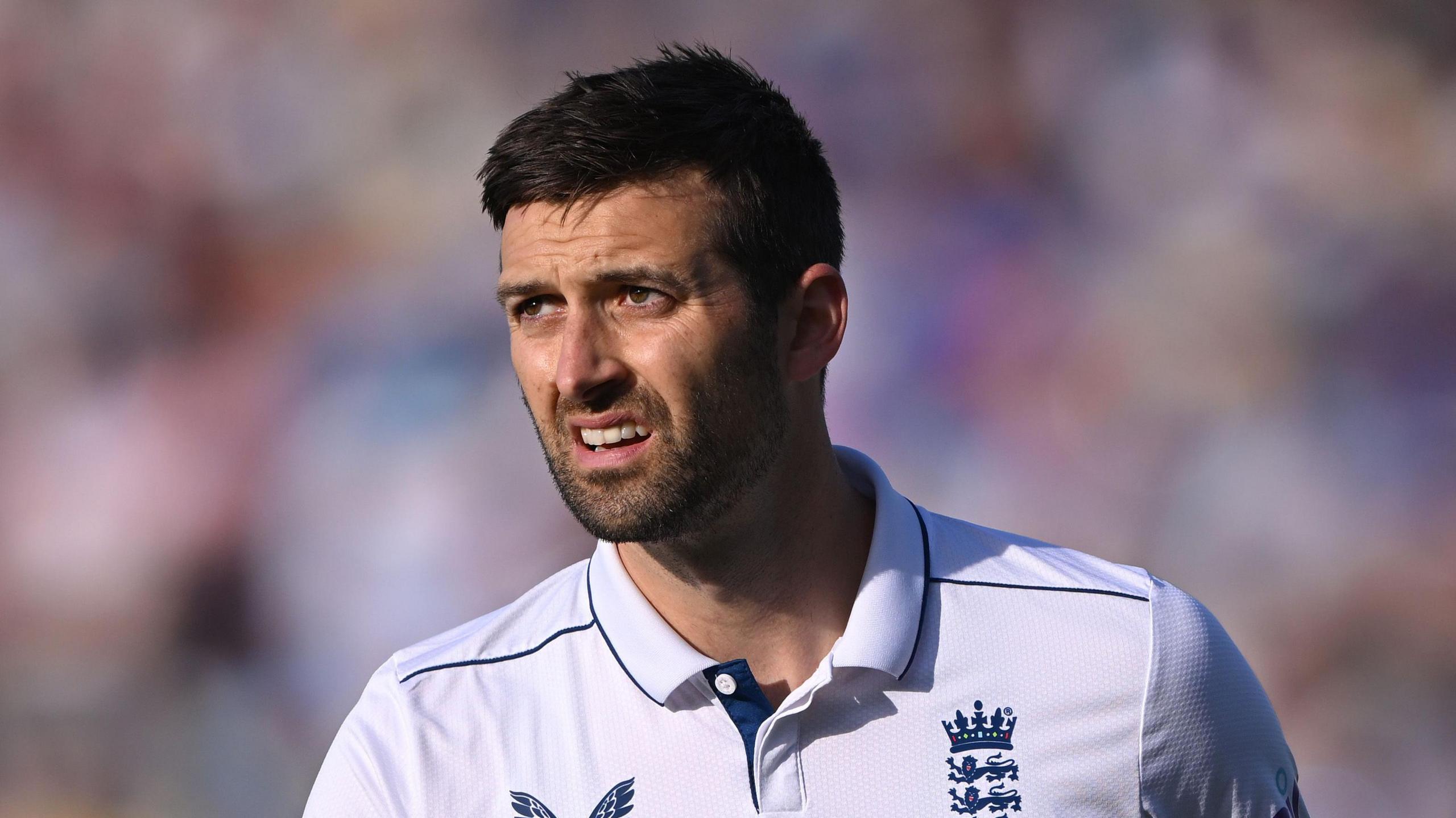 England bowler Mark Wood looks on during a Test