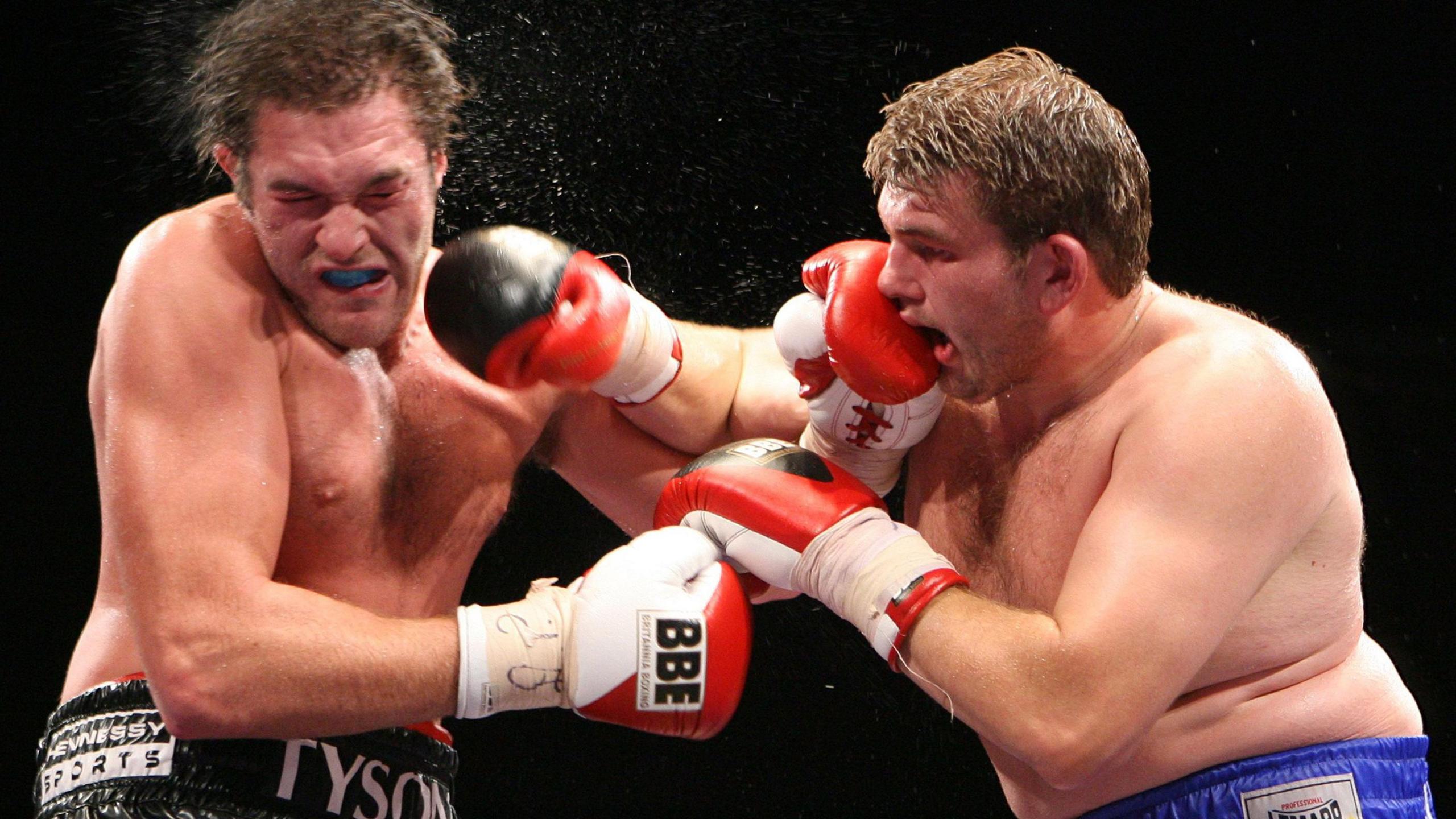 John McDermott lands a right hand on Tyson Fury