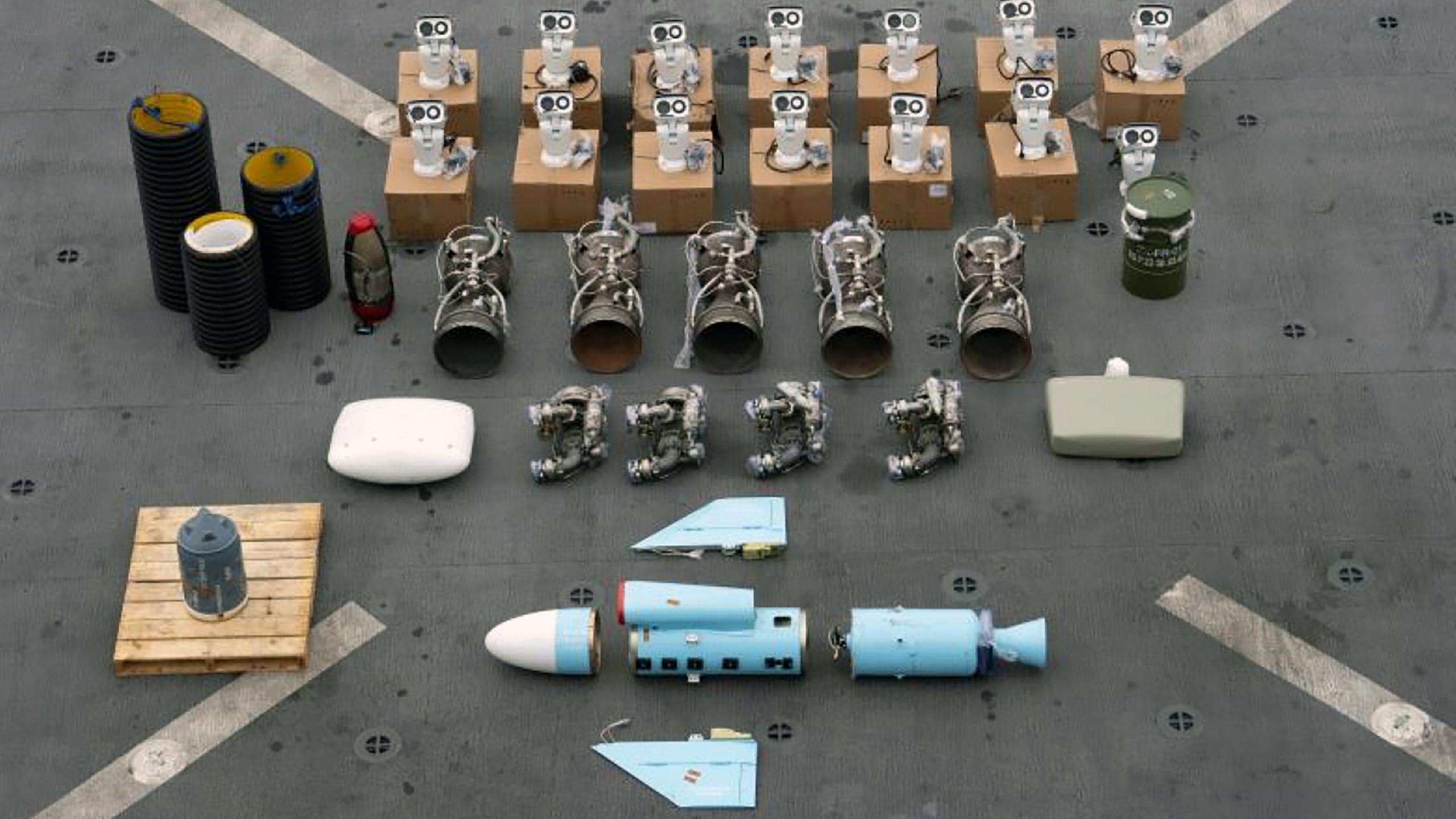 An image of weapons components laid out on a concrete floor, after being seized from Muhammad Pahlawan's boat.