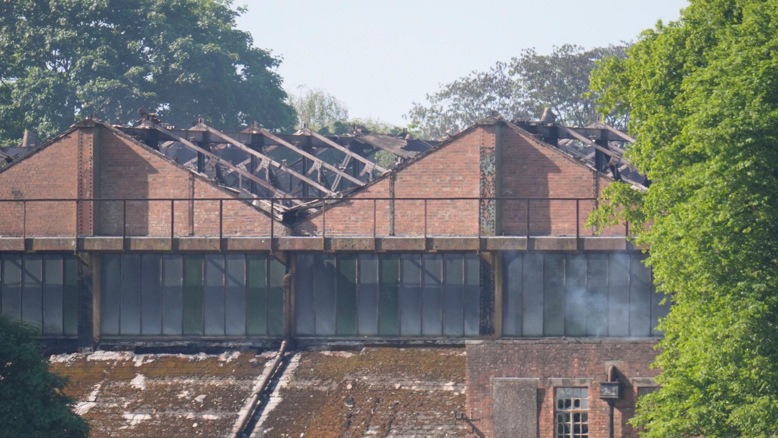 Damaged buildings following a fire at Bicester Motion