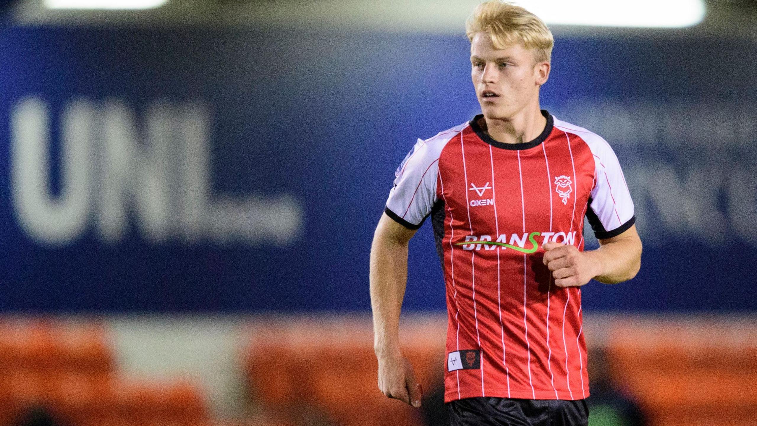 Saxon Earley during one of his few appearances for Lincoln City this season