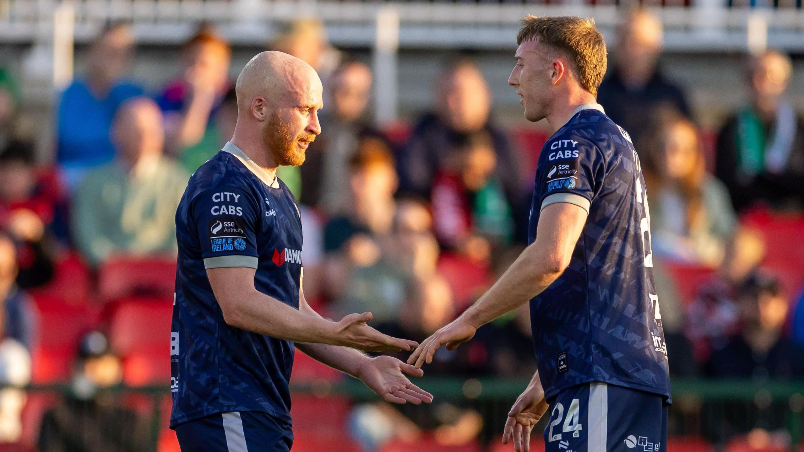 Liam Boyce and Sam Todd celebrating the first Derry goal