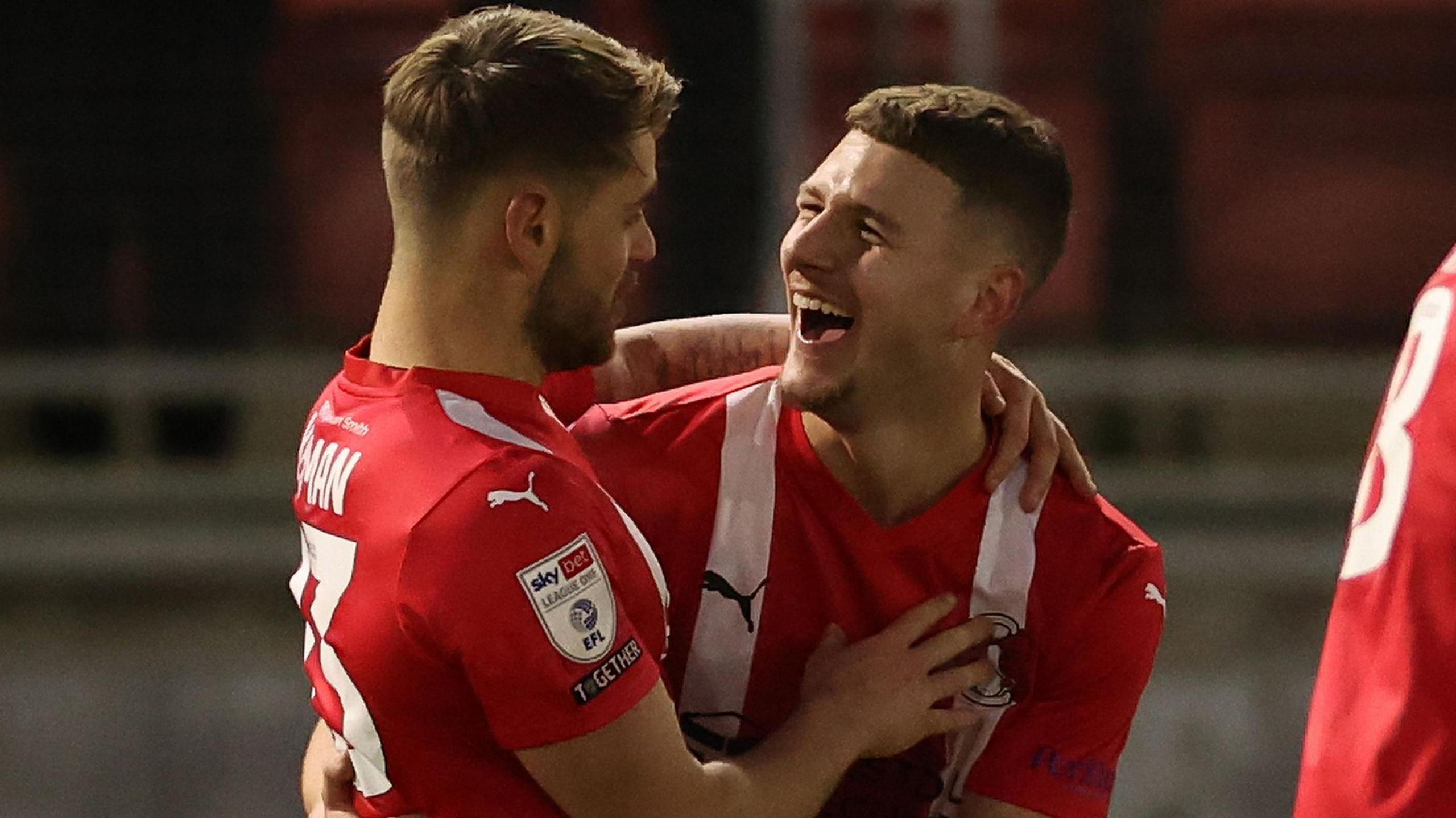 Charlie Kelman [left] and Jamie Donley [right] celebrate after Donley scores for Leyton Orient