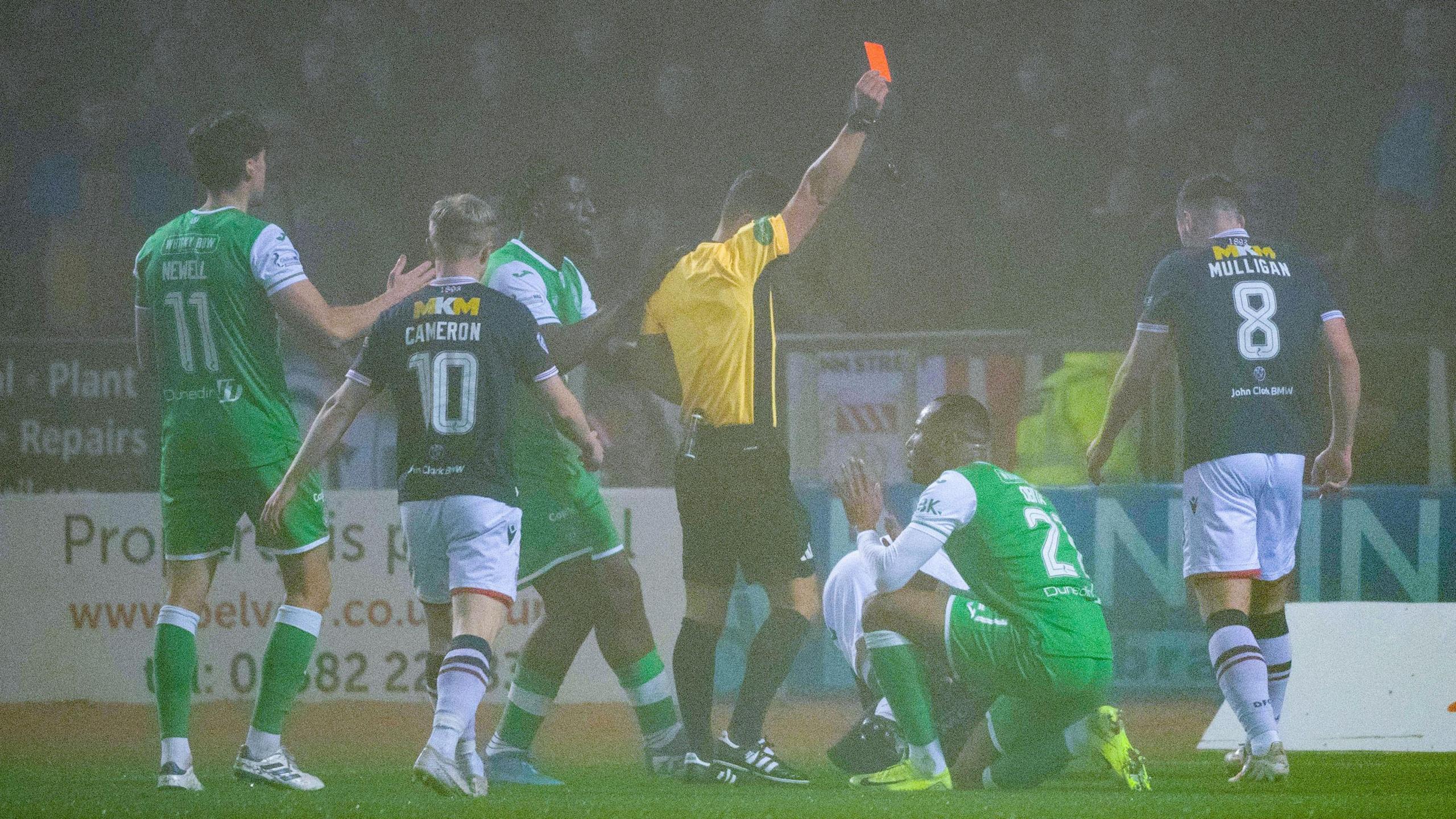 Jordan Obita is sent off for a tackle on Dundee midfielder Mo Sylla