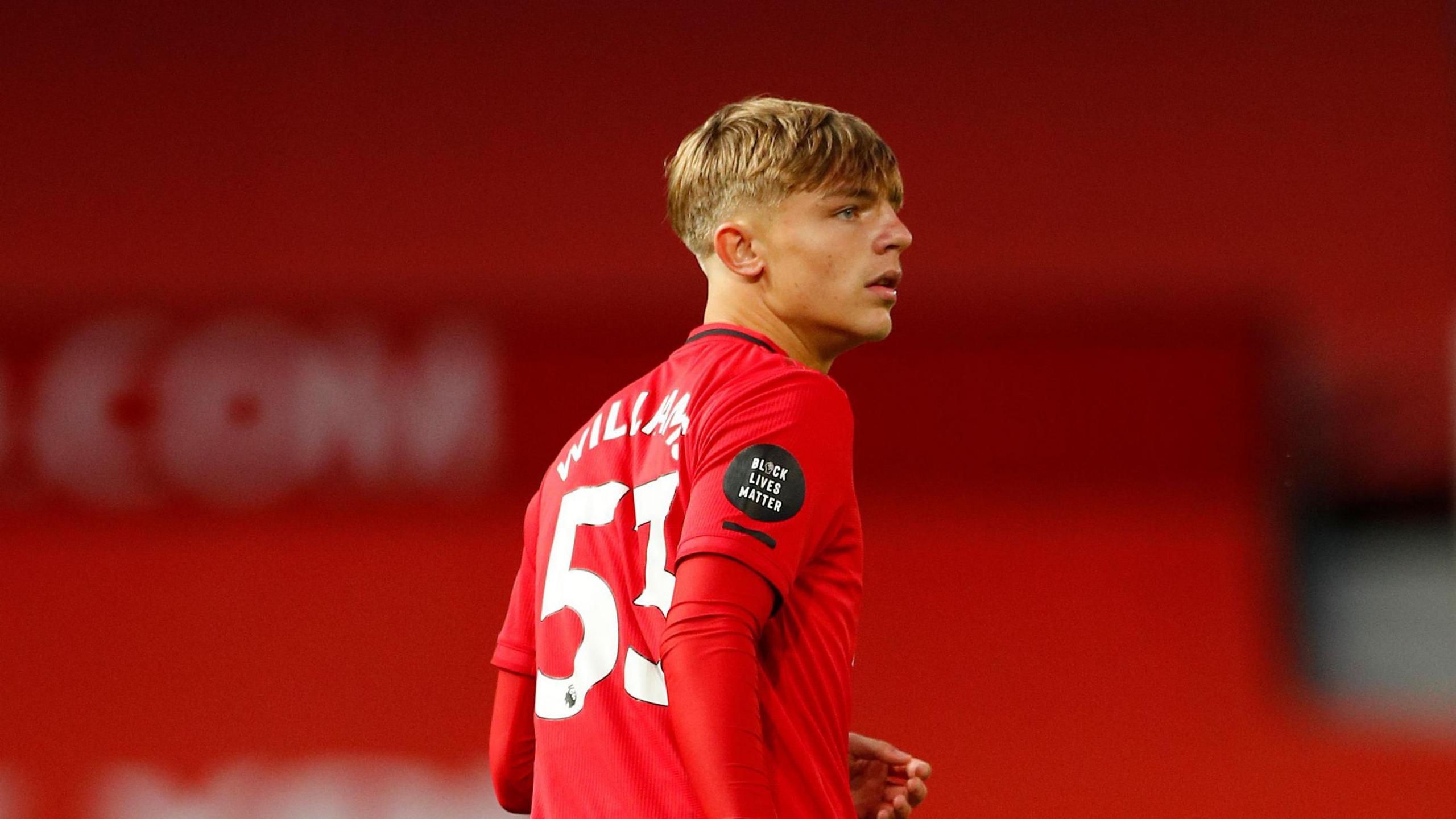 Brandon Williams, wearing no.53, playing for Manchester United in 2020