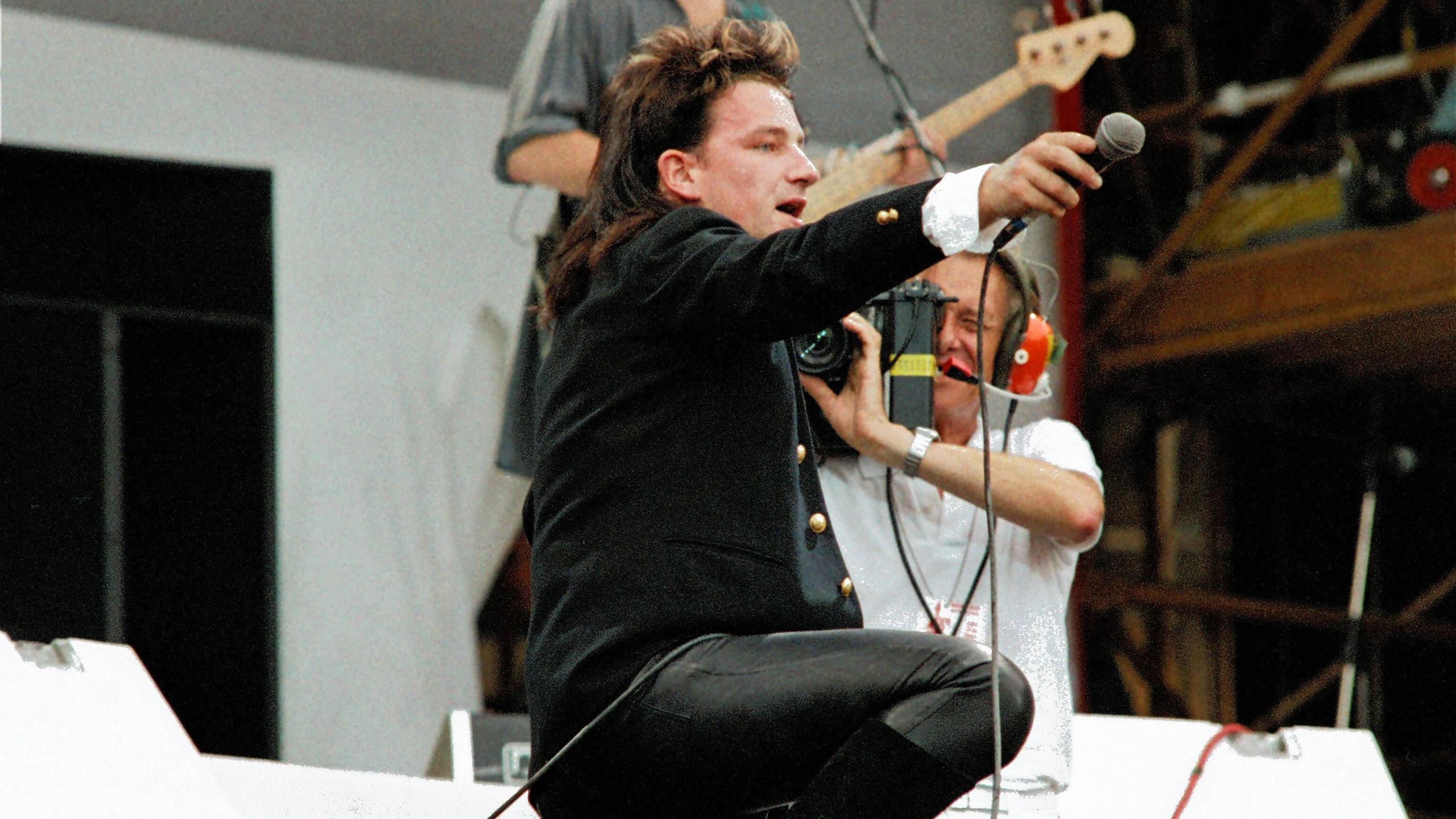U2 singer Bono performing at Live Aid