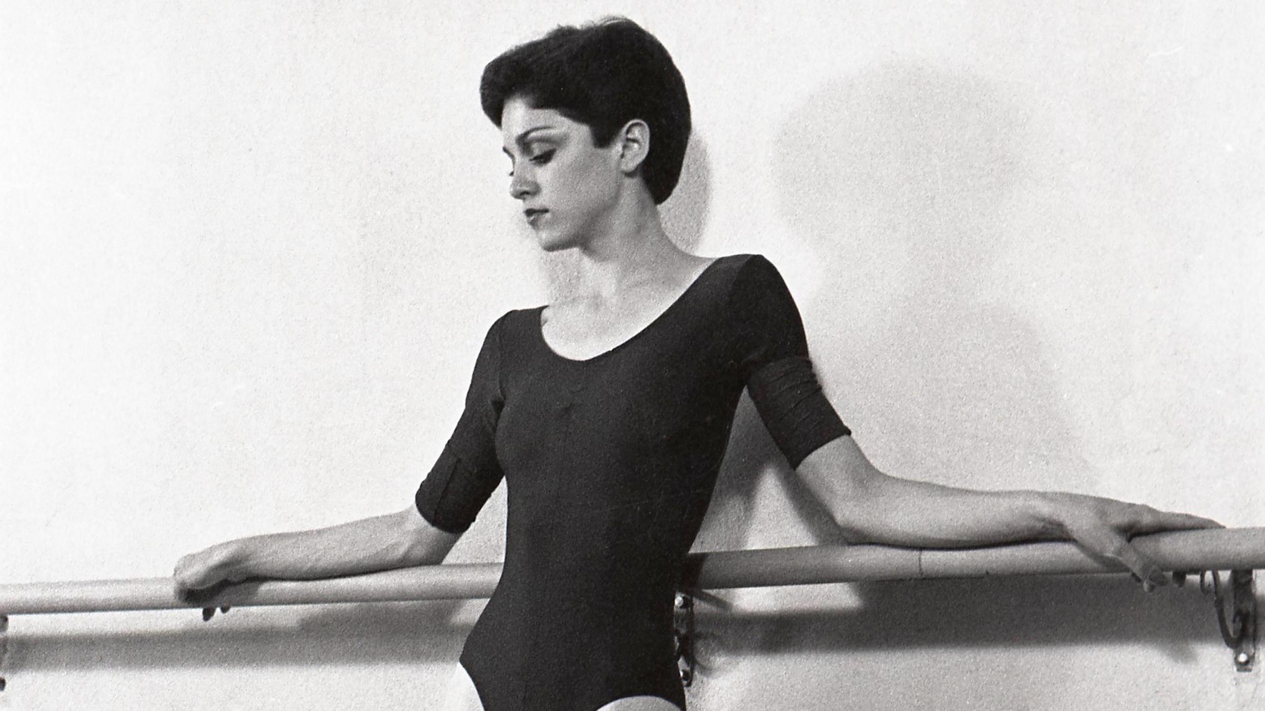 Madonna poses against a ballet barre during an early photoshoot in 1977