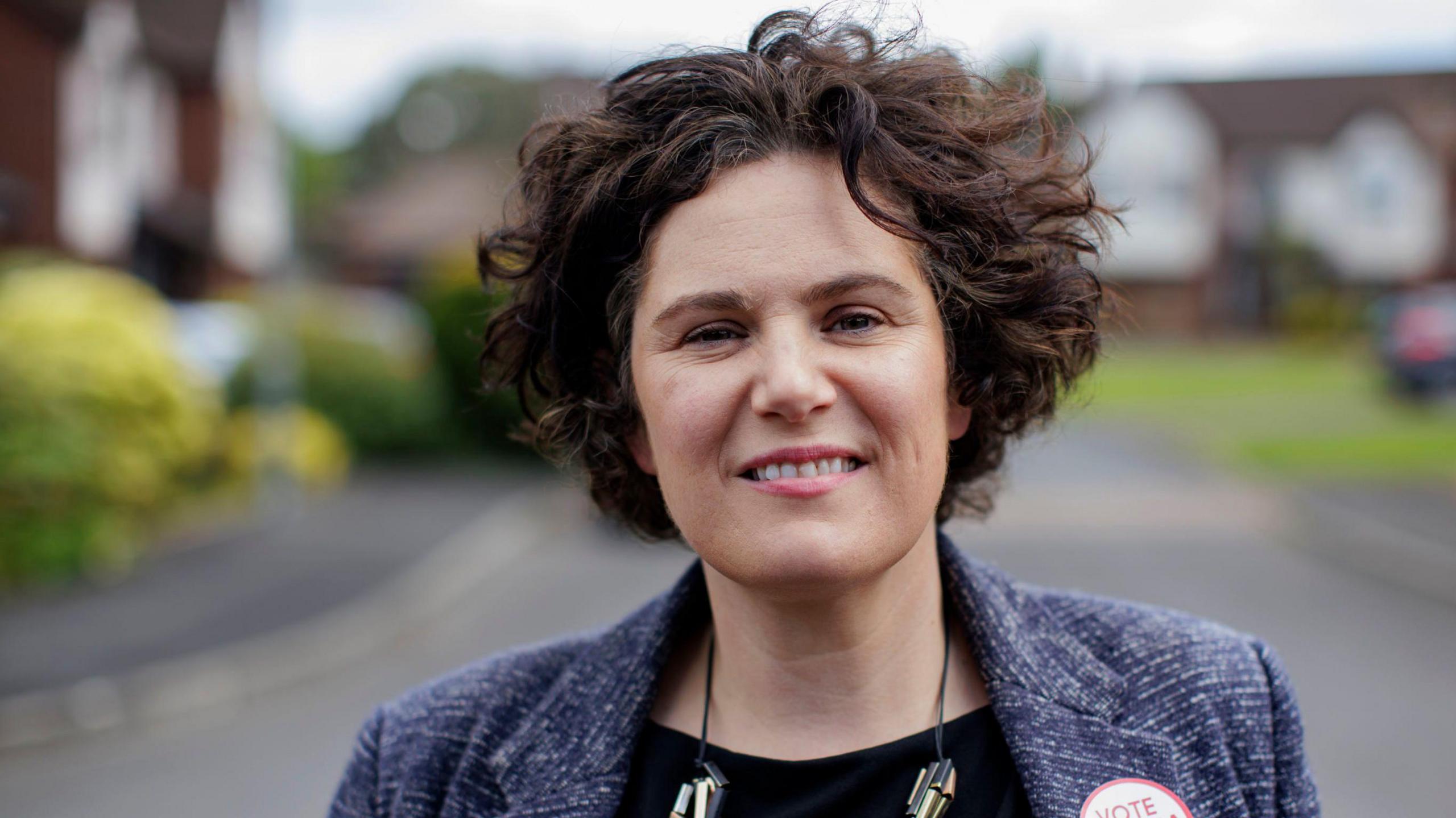 Claire Hanna, pictured in June, while canvassing in Carryduff