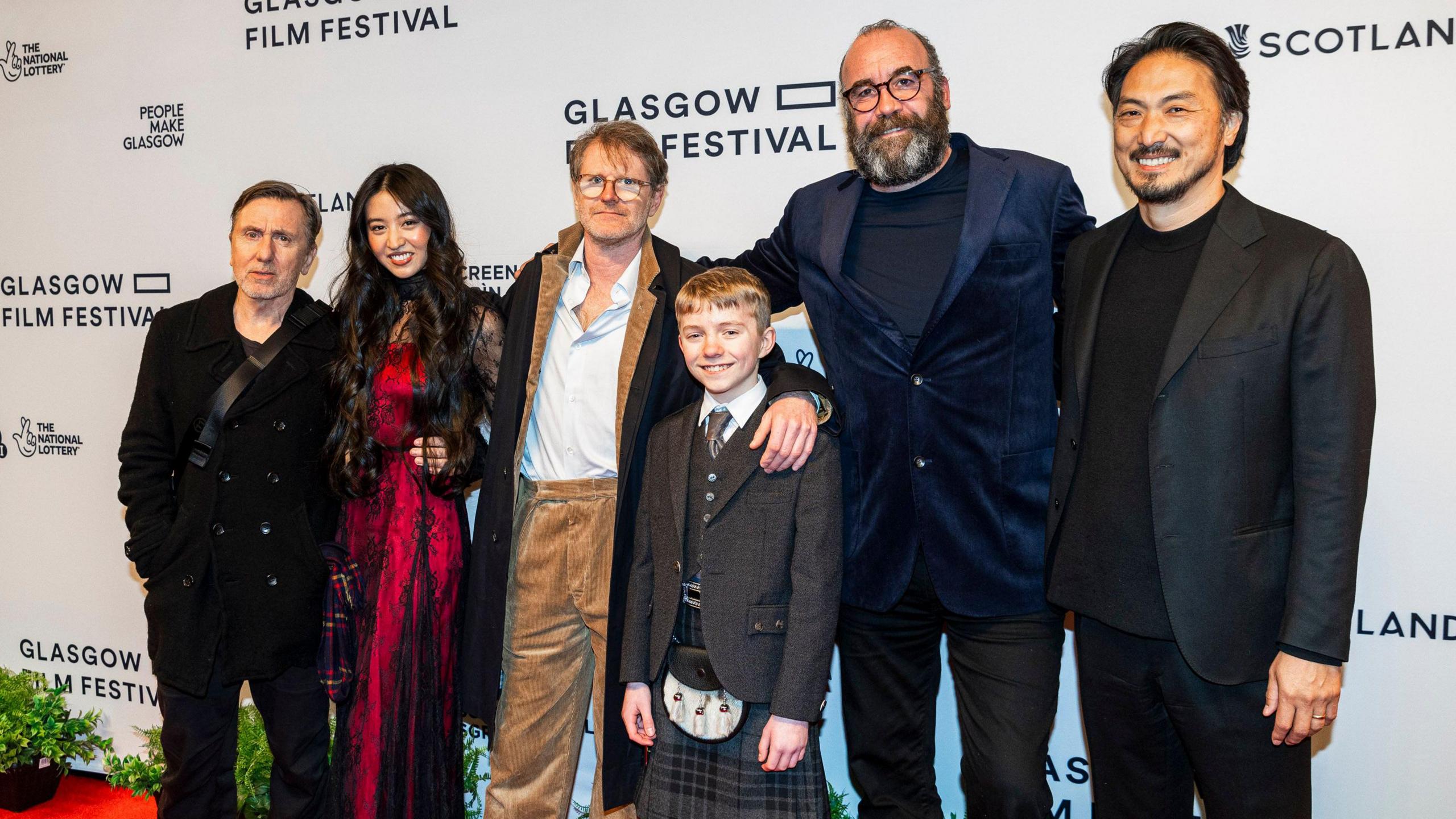 Filmmaker John Maclean on the Glasgow Film Festival red carpet with the leading Tornado cast members at the launch of the Glasgow Film Festival