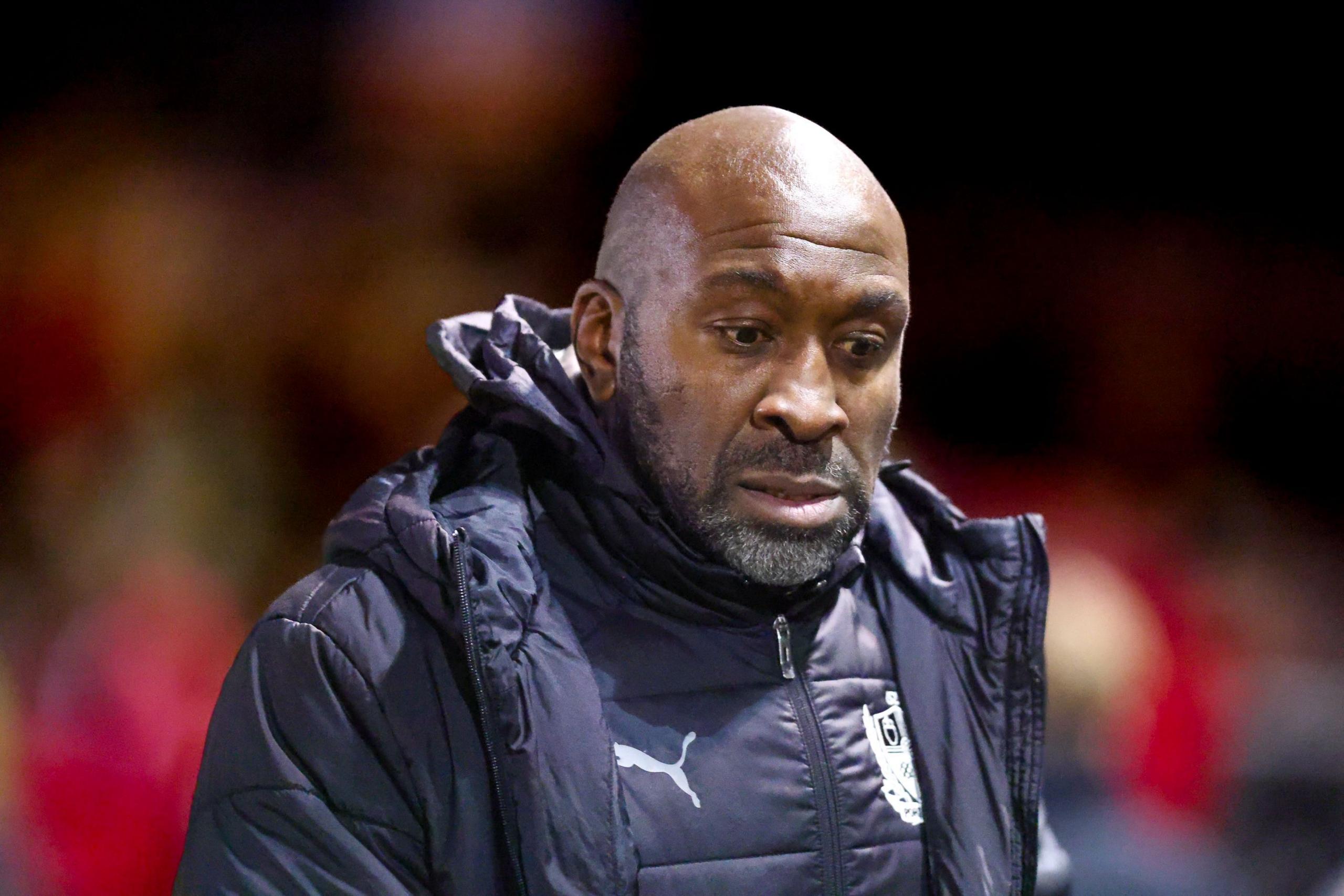 Darren Moore looks lost for inspiration as he stares to the ground
