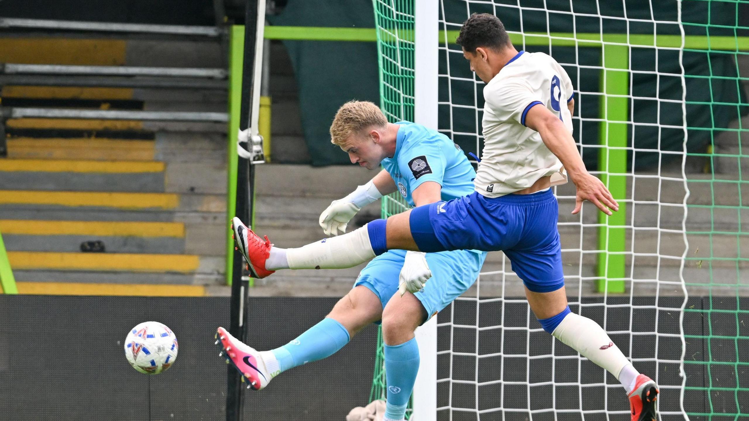 Yousef Salech closes down the Forest Green keeper during a pre-season friendly
