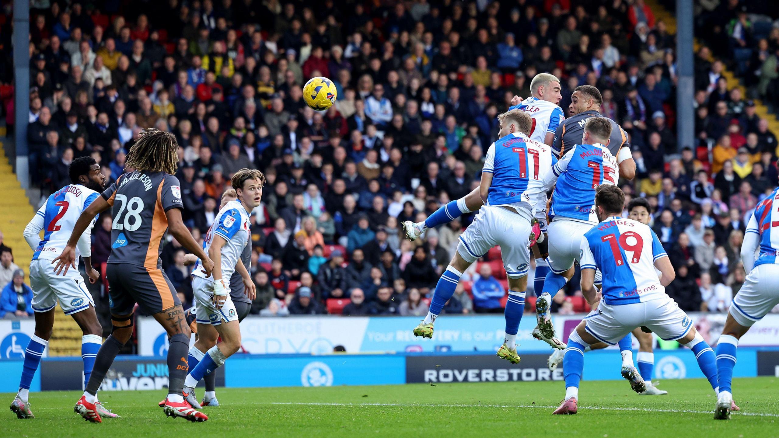 Carlton Morris rises among a scrum of Blackburn bodies to put Derby County ahead with this header