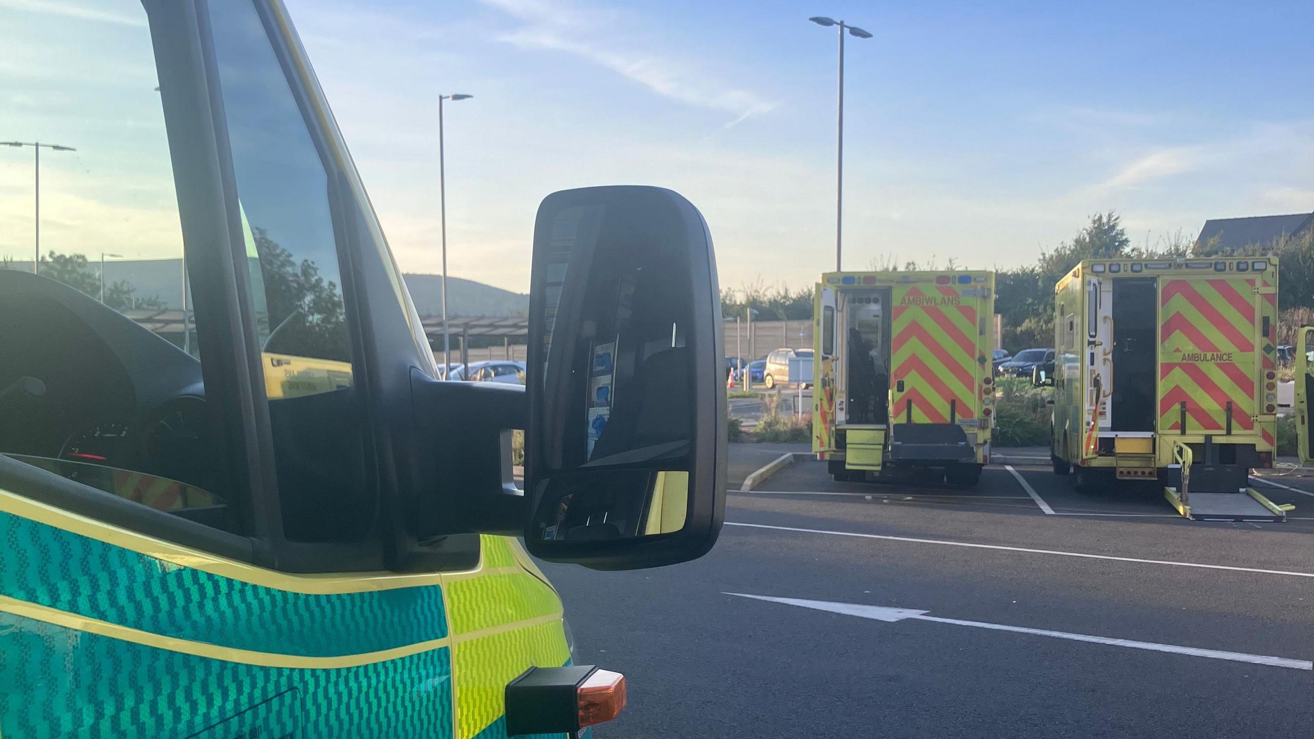 Picture of ambulances awaiting A&E outside the Grange Hospital car park. 