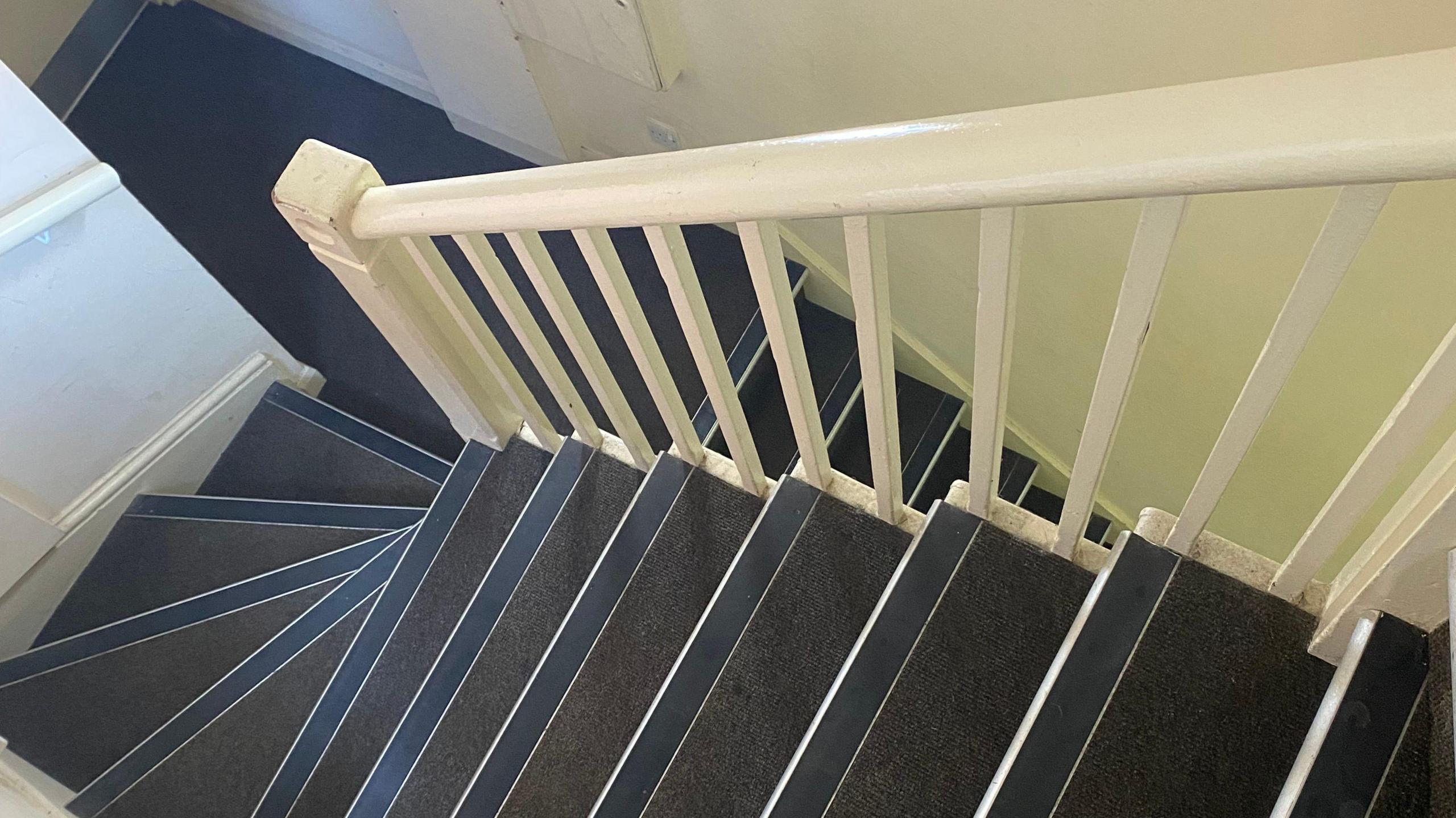 A bending stairwell viewed from high up