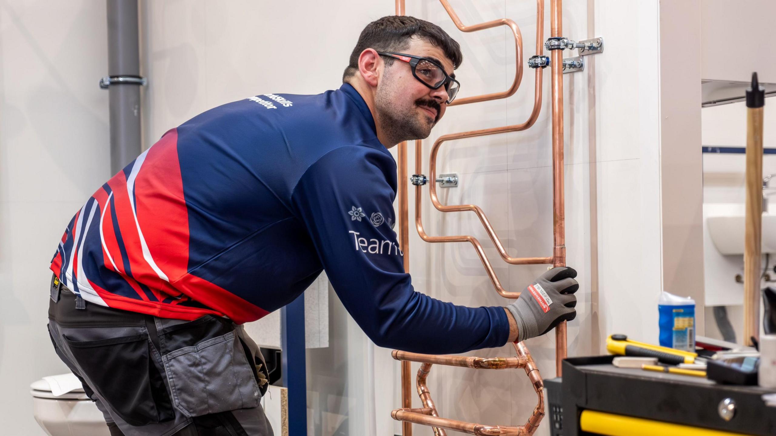 Ruben installing pipe work for part of the competition in Lyon