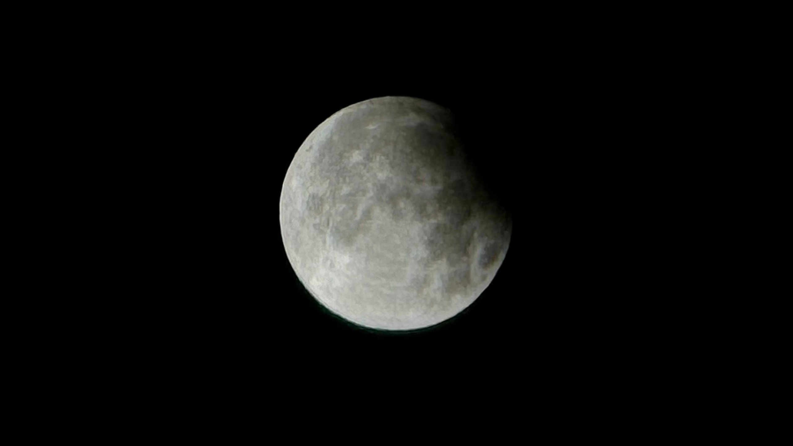 The top right corner of supermoon was cast in shadow by the eclipse