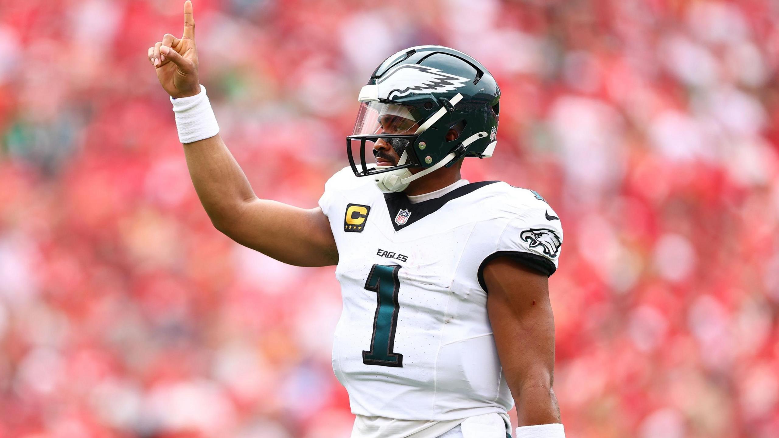 Jalen Hurts raises his manus aft nan Kansas City Chiefs suffer to nan Philadelphia Eagles successful nan NFL 