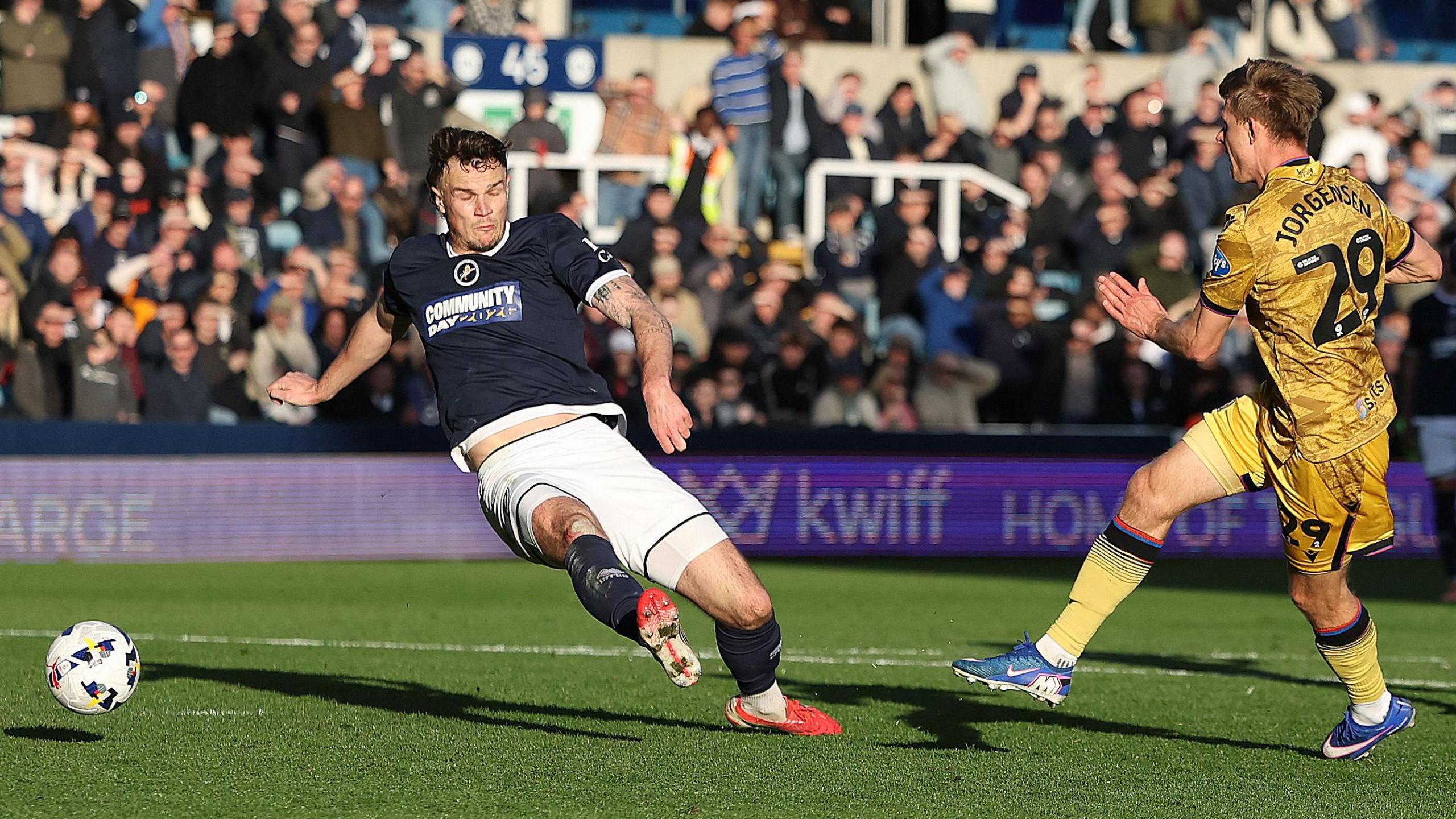 Mathias Jorgensen drills the ball off his right foot past a sliding Jake Cooper to score his second goal of the game