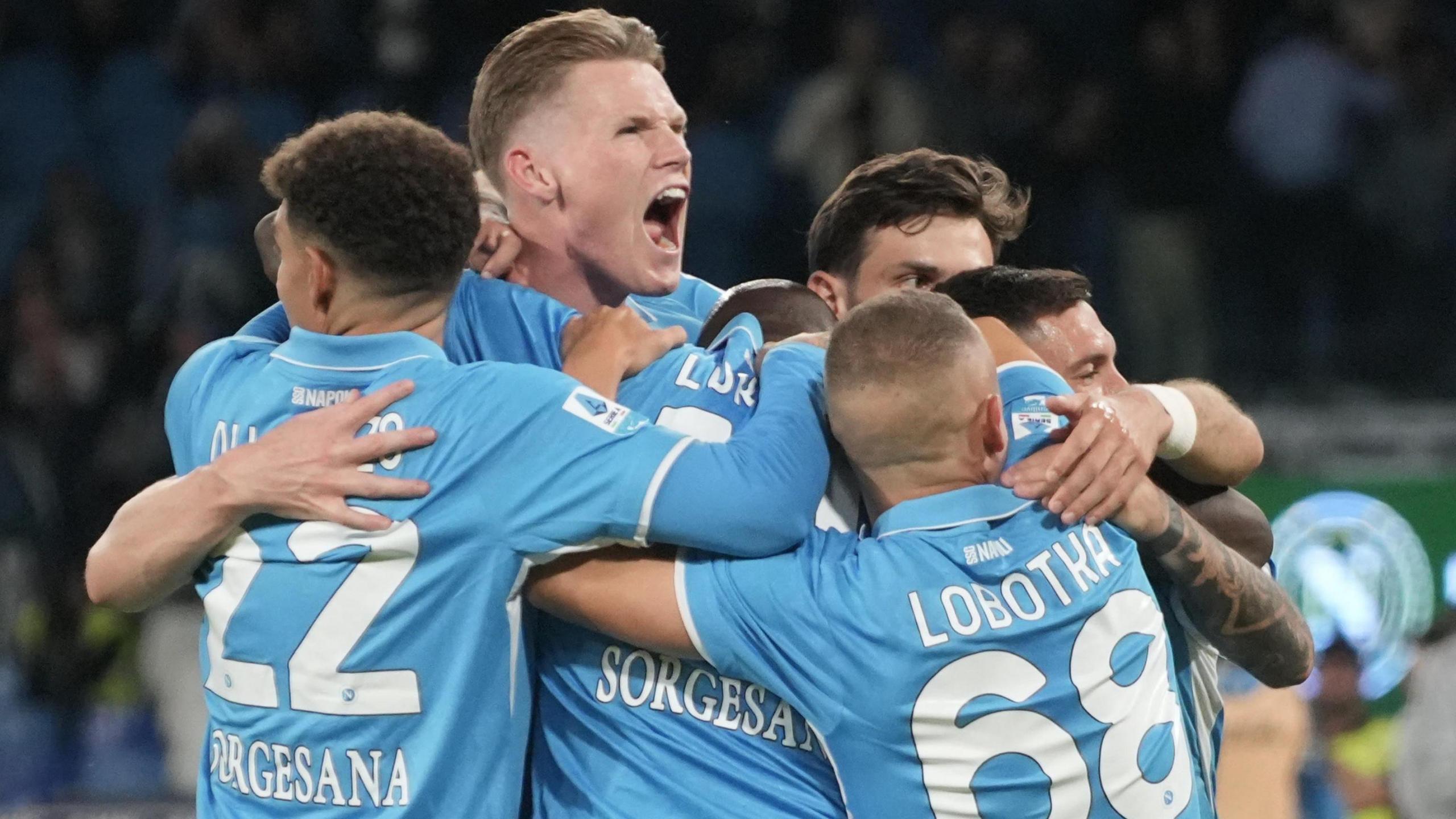 Scott McTominay celebrates with his Napoli team-mates