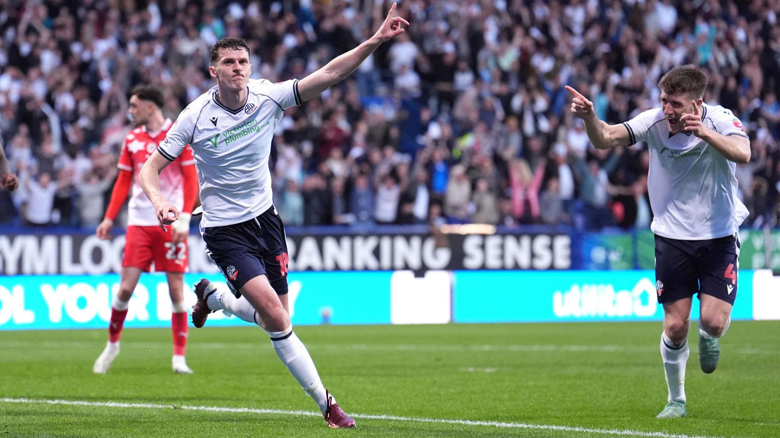 Eoin Toal celebrates a goal for Bolton against Barnsley