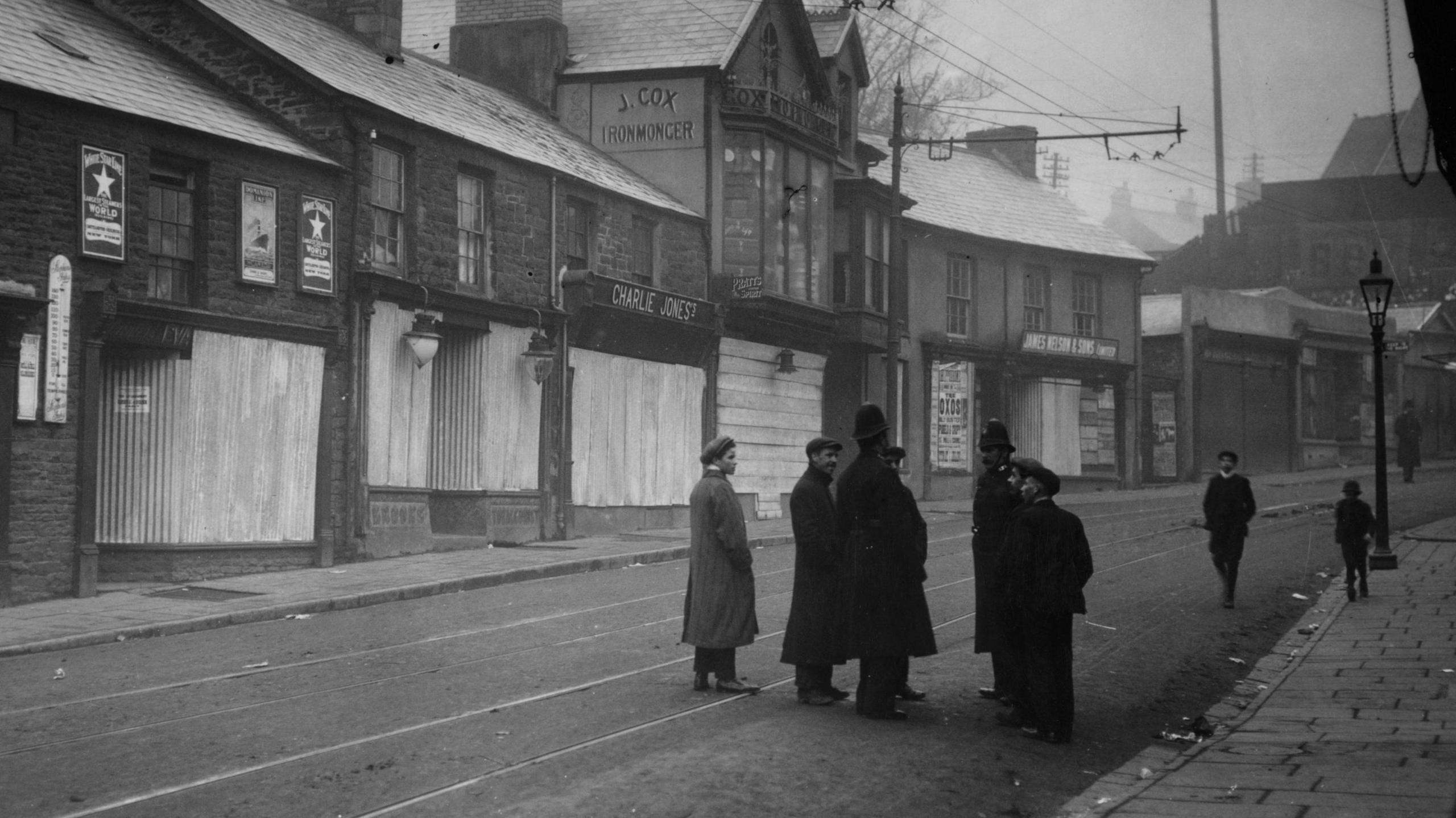 The main street in Ton-y-Pandy with shops barricaded during the strikes and riots at Glamorgan Colliery.