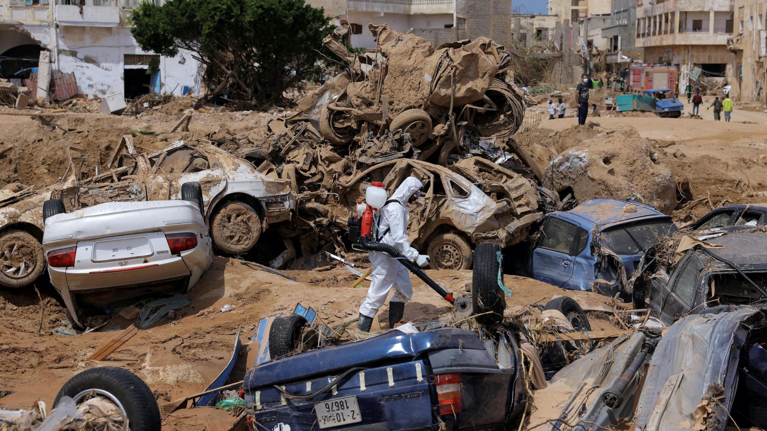 Upturned cars and destroyed buildings in Dern, Libya, in September 2023