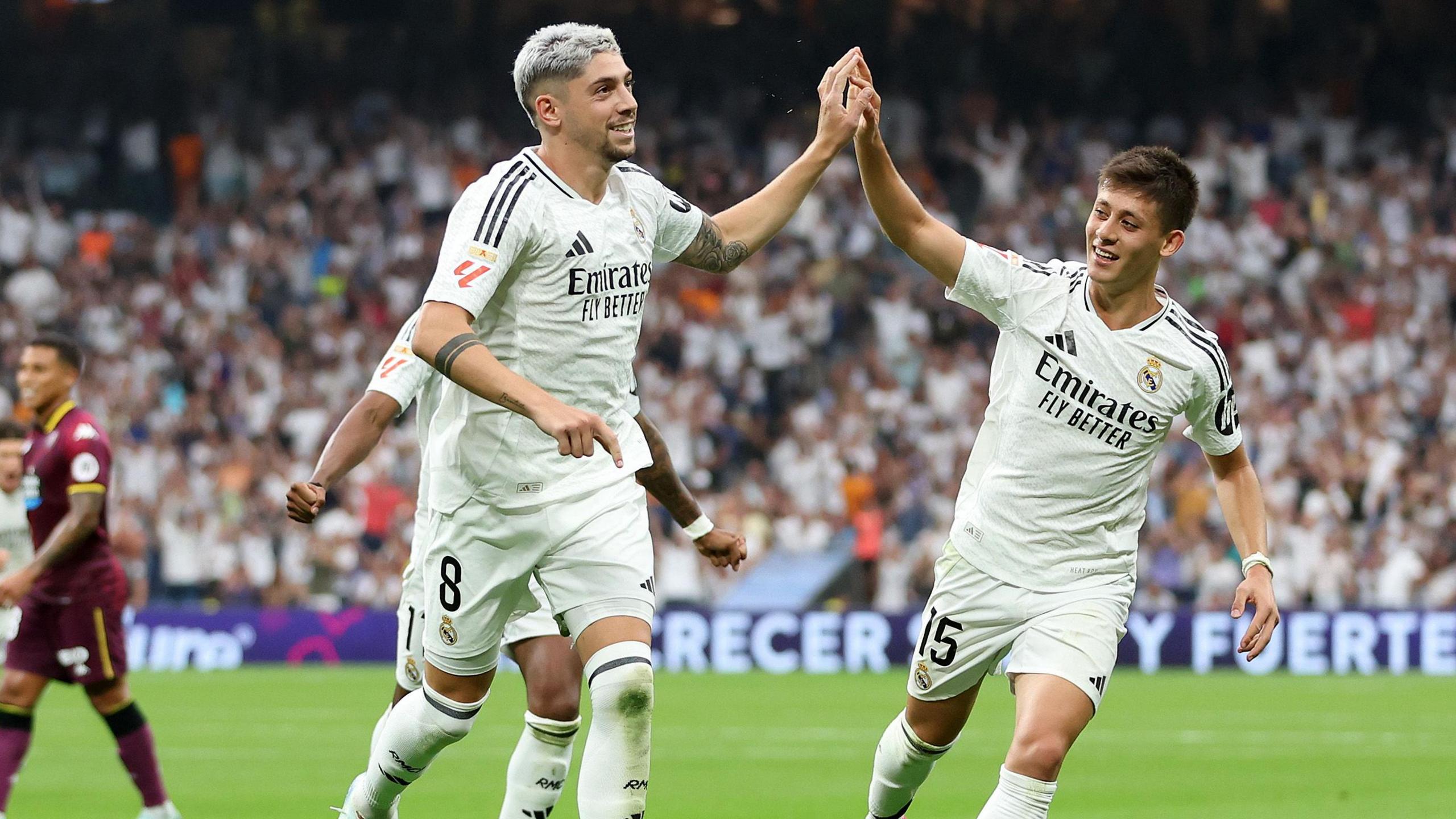 Federico Valverde and Arda Guler celebrate after Valerde scores against Real Valladolid