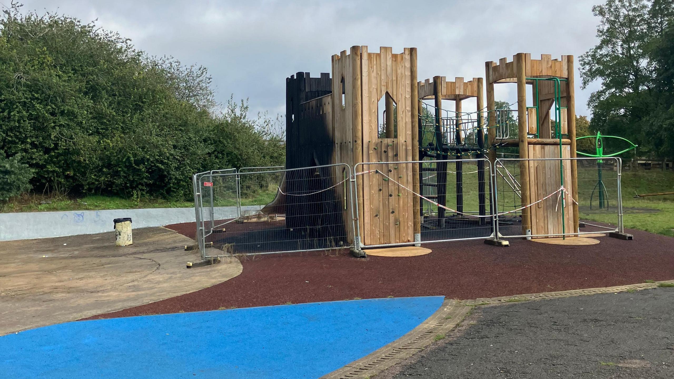 Wooden play structure in park