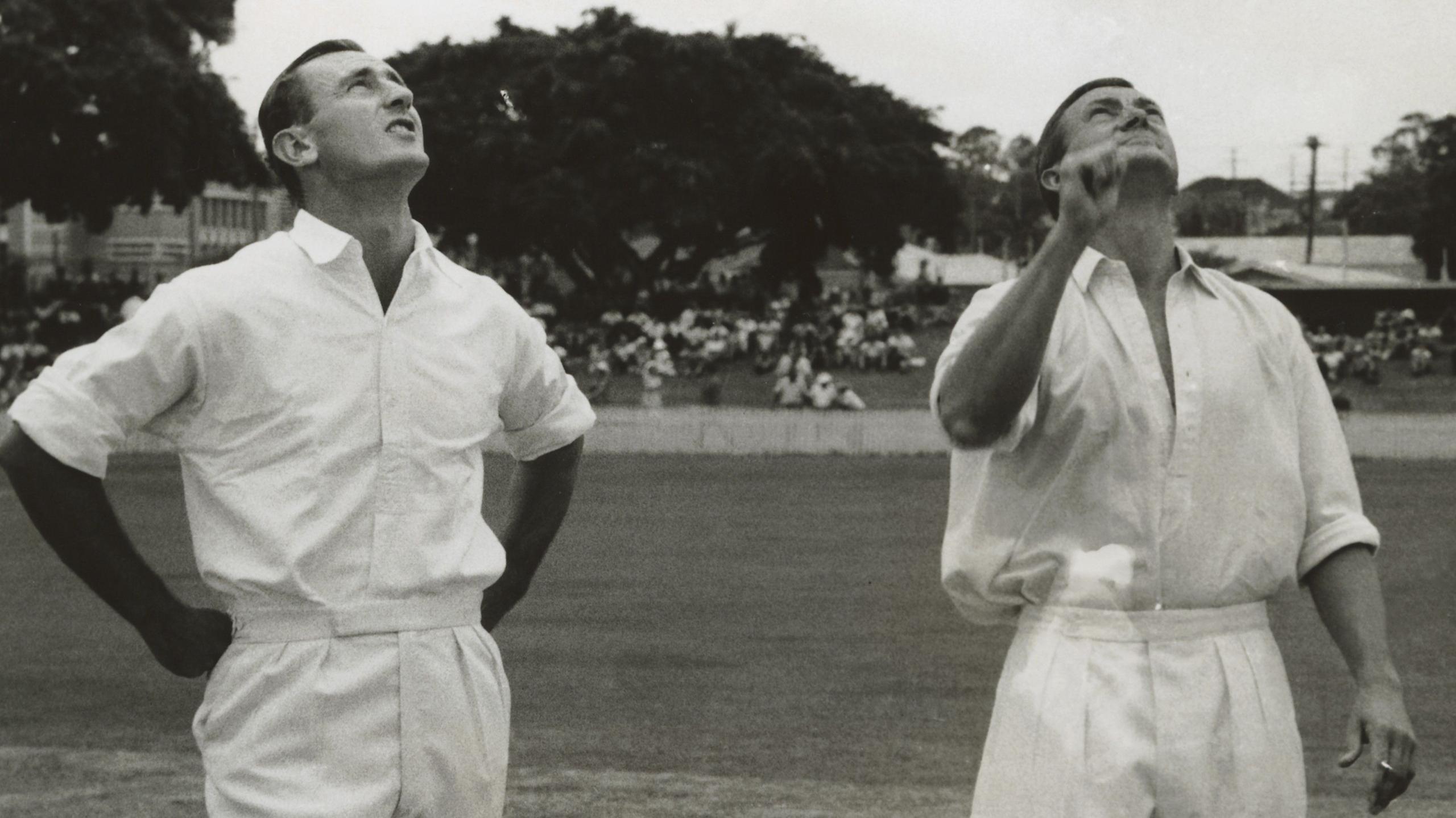 English captain Ted Dexter and Australian captain Richie Benaud watch the coin toss at the start of the first Ashes Test in 1962