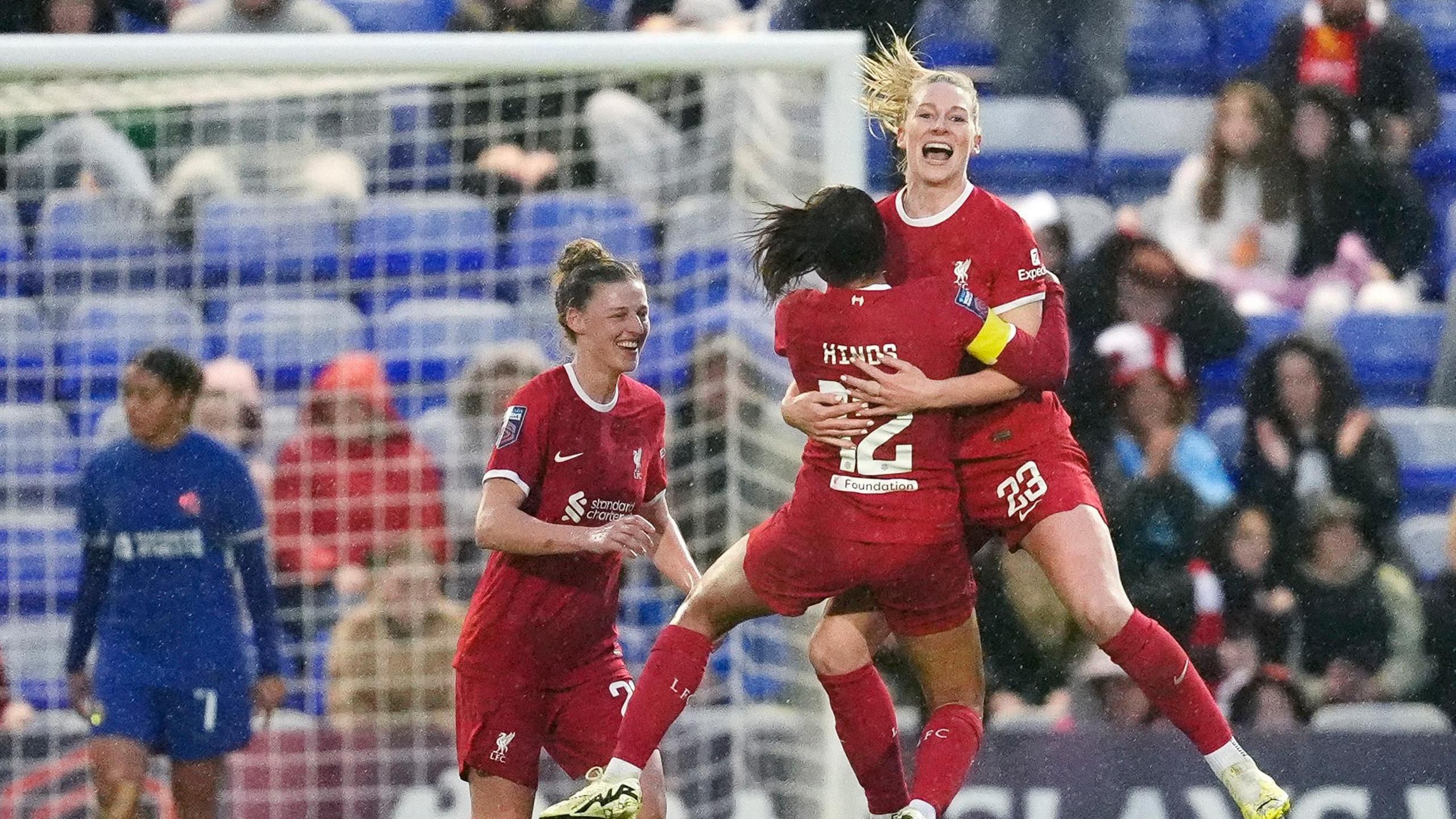 Liverpool celebrate after scoring against Chelsea