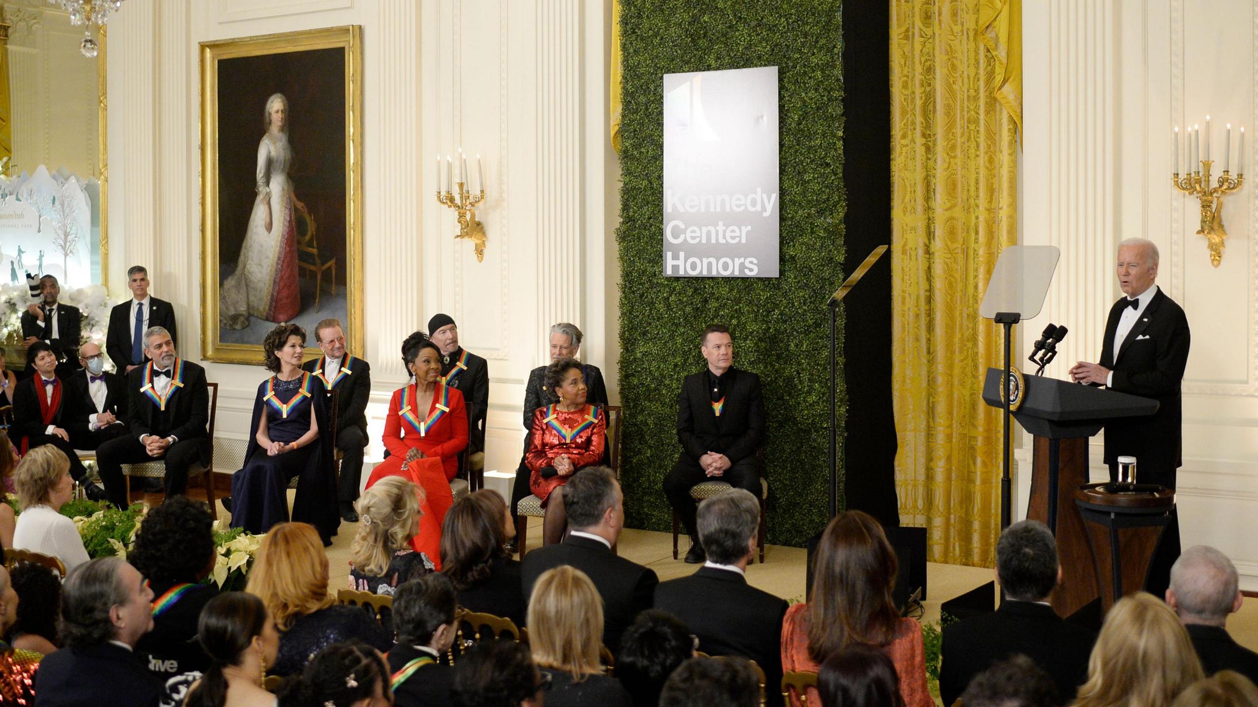 US President Joe Biden (R) speaks at a reception for Kennedy Center Honorees in the East Room of the White House in Washington, DC, USA, on 04 December 2022. The Honorees are actor and filmmaker George Clooney, singer-songwriter Amy Grant, singer Gladys Knight, composer Tania Leon, and Irish rock band U2, comprised of band members Bono, The Edge, Adam Clayton, and Larry Mullen Jr.