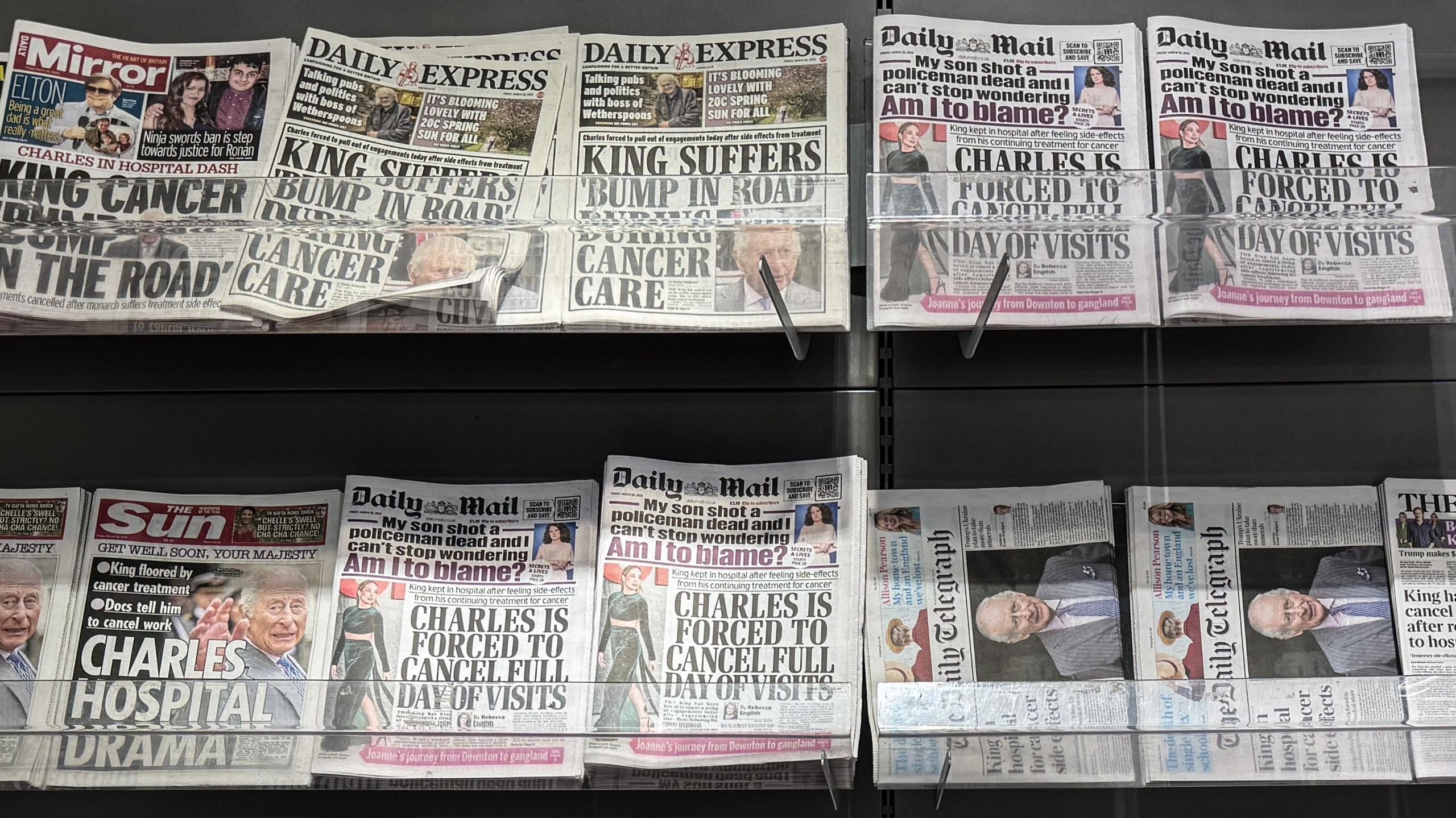 Newspapers on sale at a newsagent.