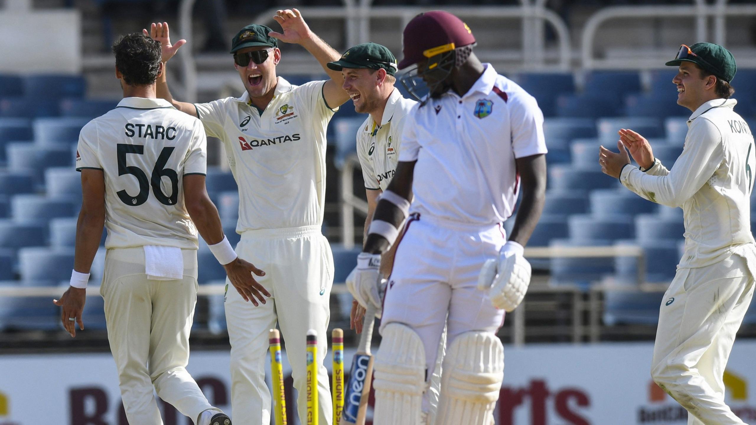 Australia celebrate after Mitchell Starc bowls Jaylen Seales in third Test in Jamaica