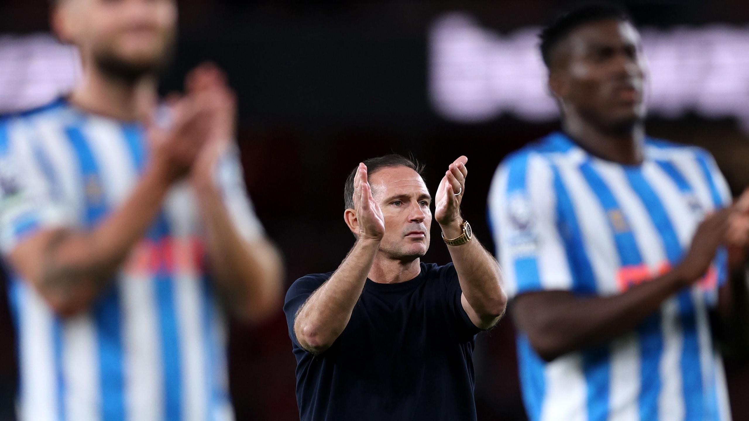 Frank Lampard, manager of Coventry City, acknowledges the fans after their defeat by Arsenal