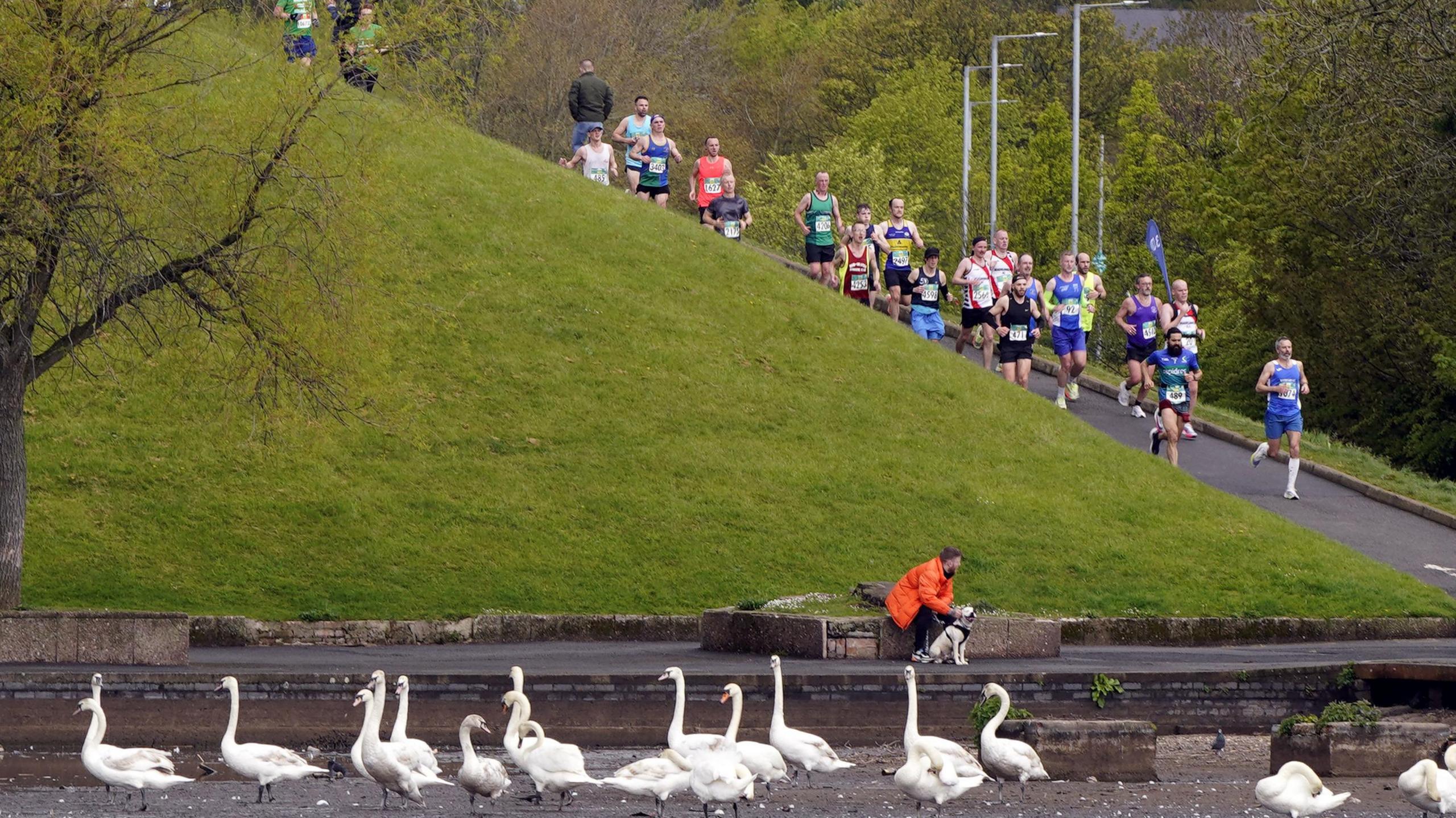 Runners run downhill at waterworks