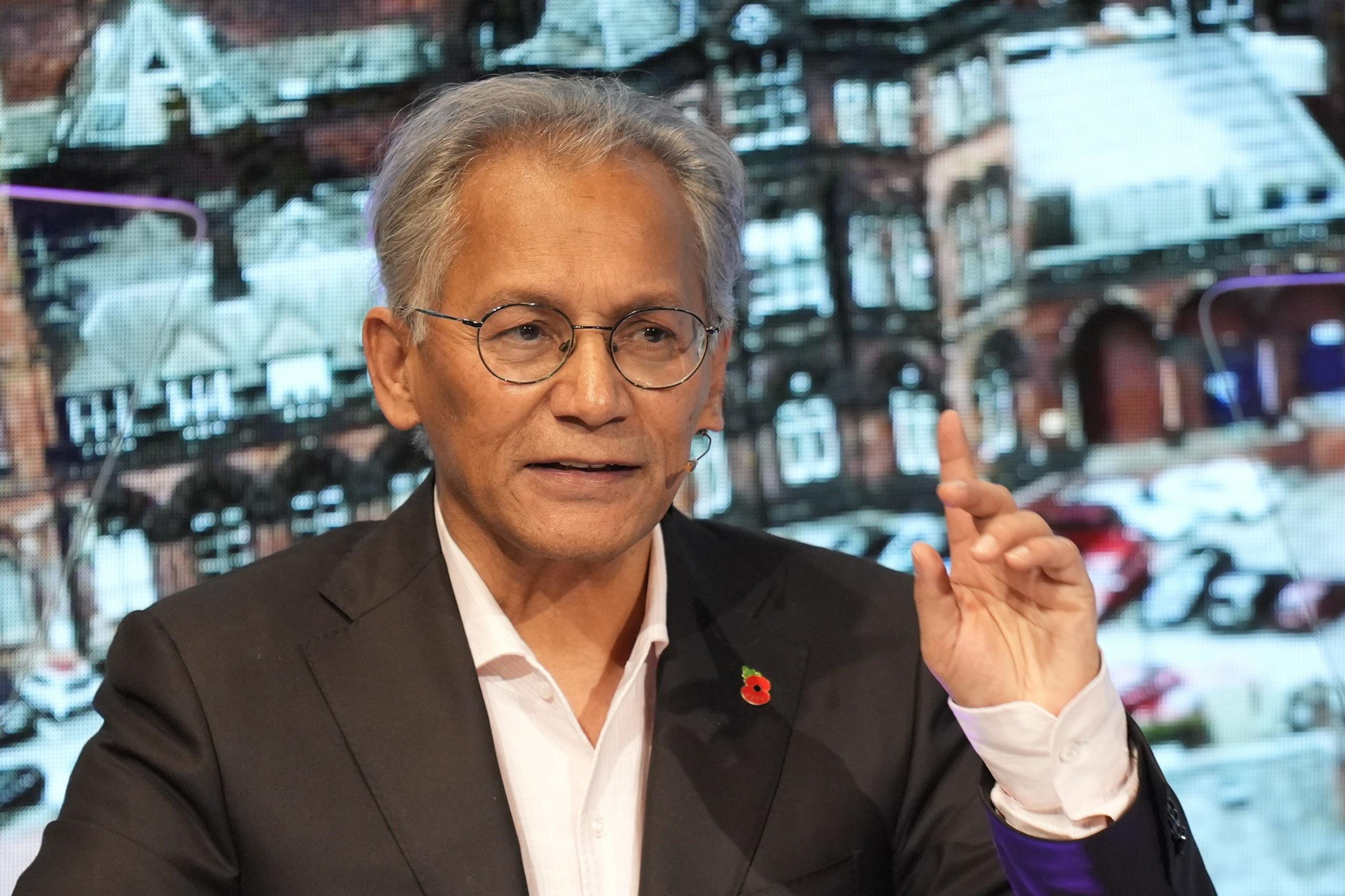 Samir Shah in a suit