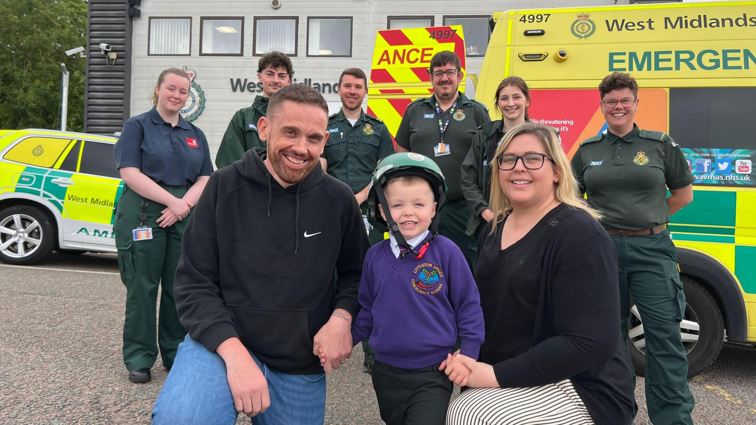 Richard Ward with his son Lucas and wife Teresa and paramedics at Tollgate ambulance hub